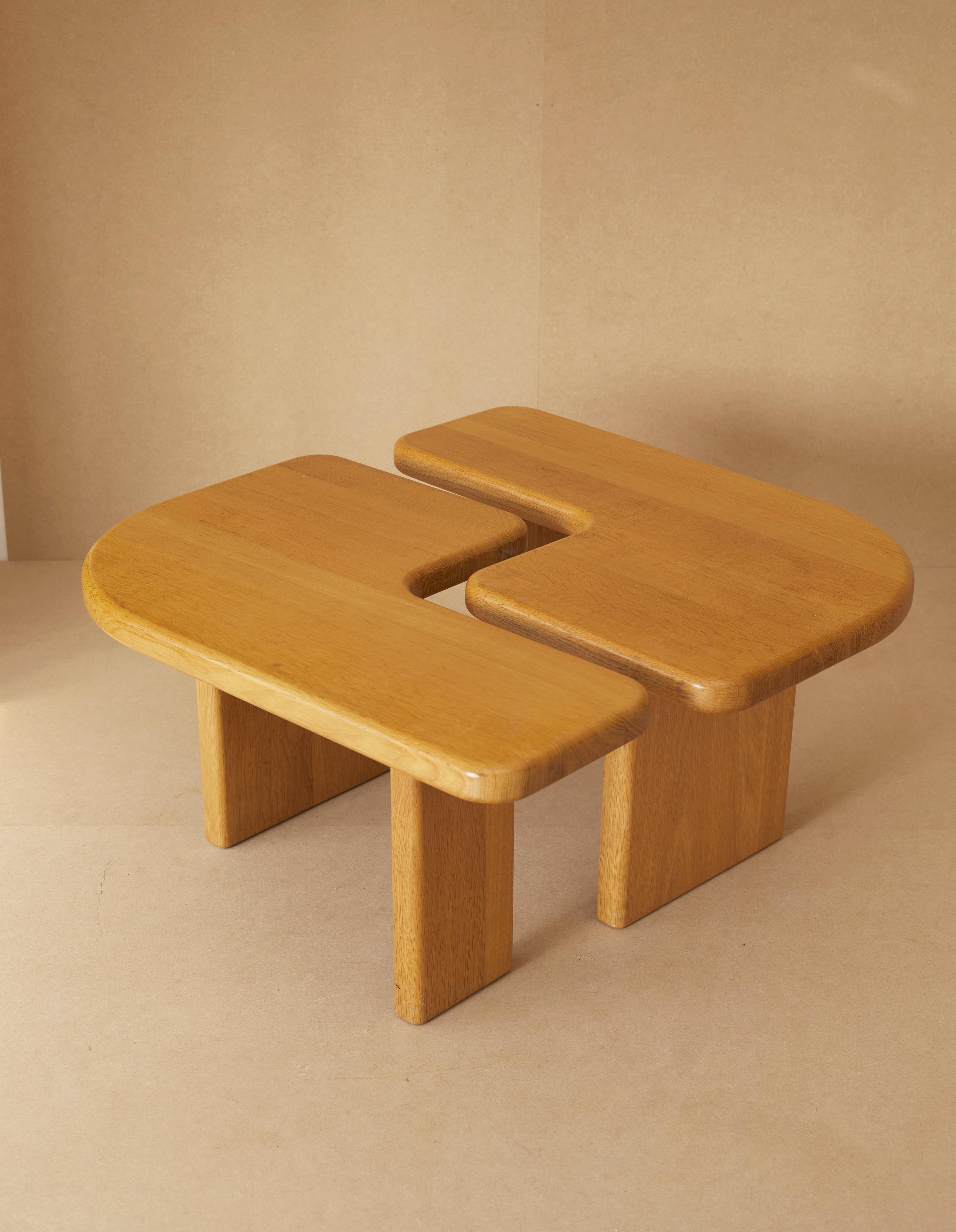 Twin coffee tables by Redureau, France, circa 1980. Limited, made-to-order edition in solid oak. 

Redureau was a small, French edition house which produced in the 1970-80s limited edition furniture in solid oak. Each piece was made-to-order and