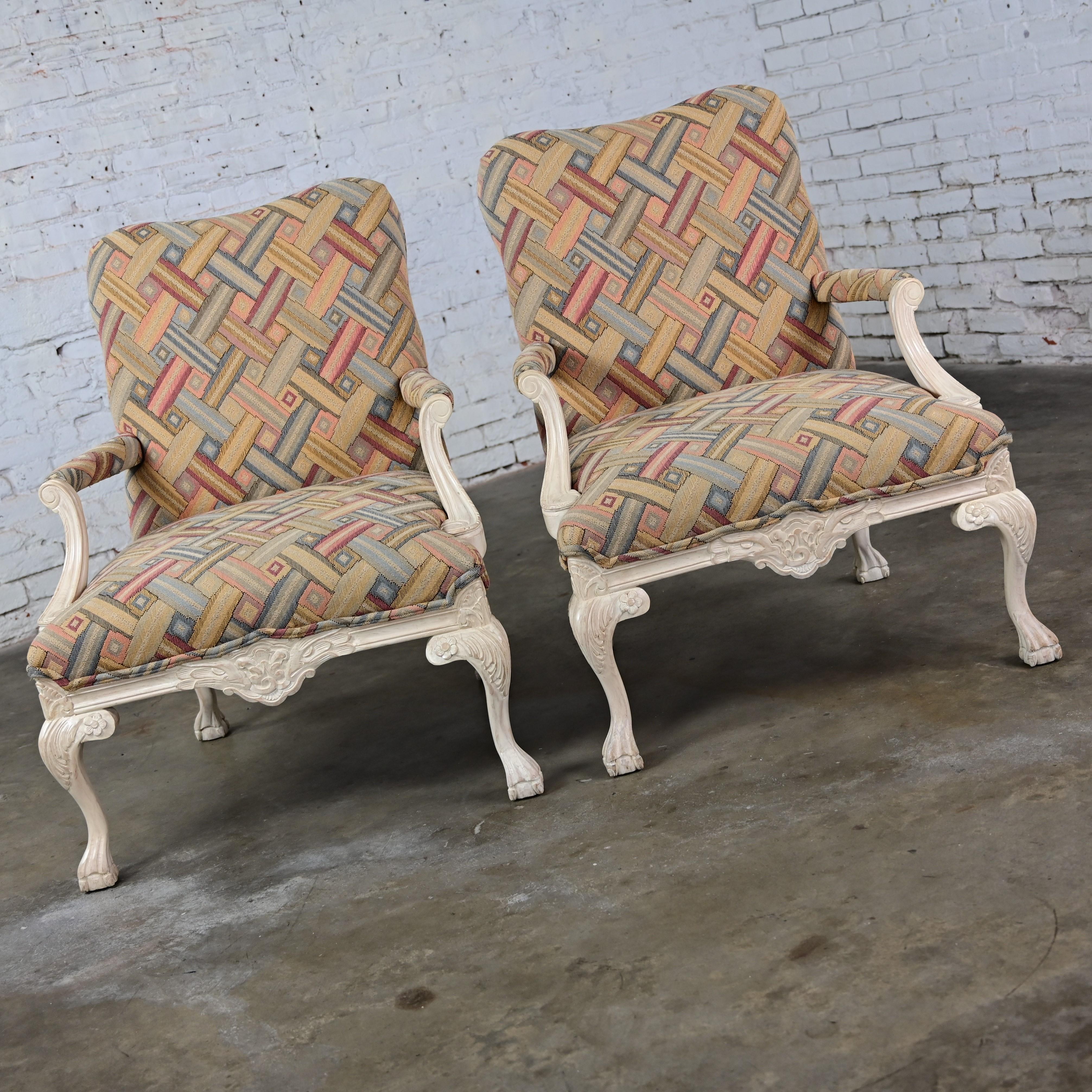 Lovely 1980’s French Louis XV style Fauteuil armchairs comprised of whitewashed wood frames with cabriole legs, claw feet, and basket weave contemporary fabric. Beautiful condition, keeping in mind that these are vintage and not new so will have