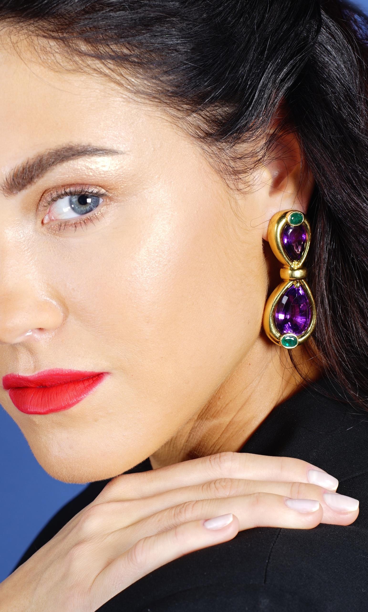 So Sexy and Fashionable! Those Earrings are handsome for your Summer in the French Riviera, with four oval Emerald and four impressive size Pear shape Amethysts on yellow gold 18k.
Signed Verney.
Total height: 2.36 inches (6.00 centimeters).

Total