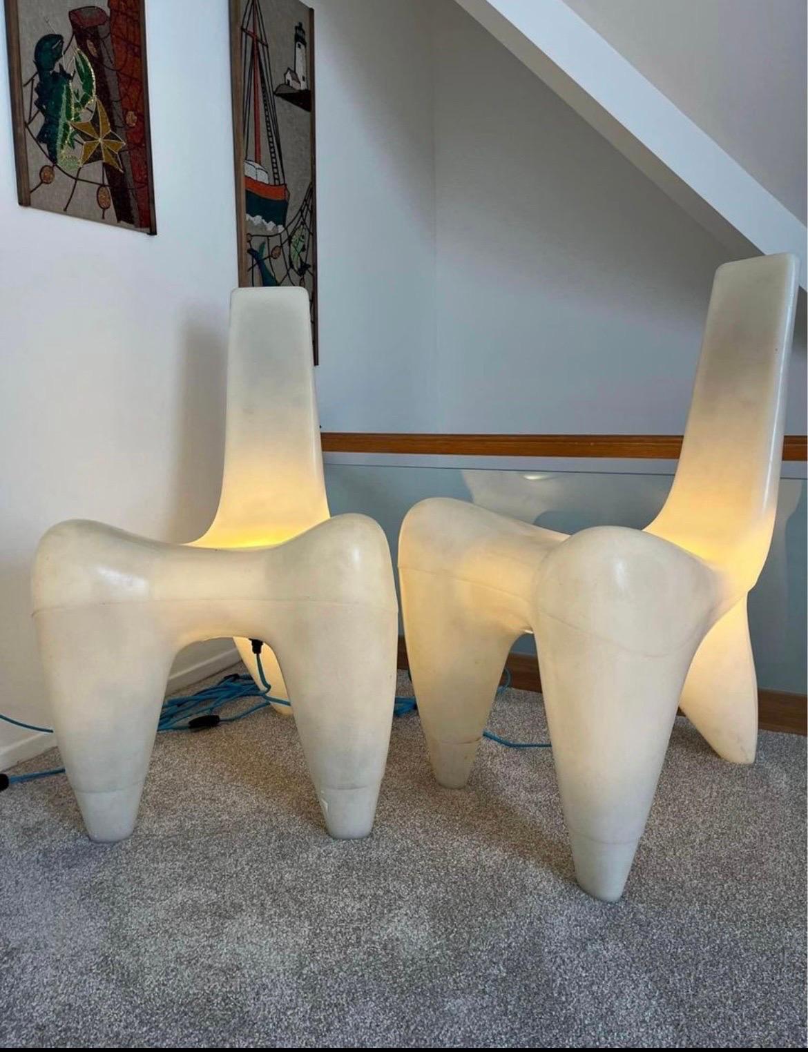 Pair of light up Galactica lounge chairs designed by Douglas Mont for Jetnet Designs. These were designed and made in the ‘90s in France. While not Mid Century Modern they blend right in and make a super fun lighting statement piece. Made of