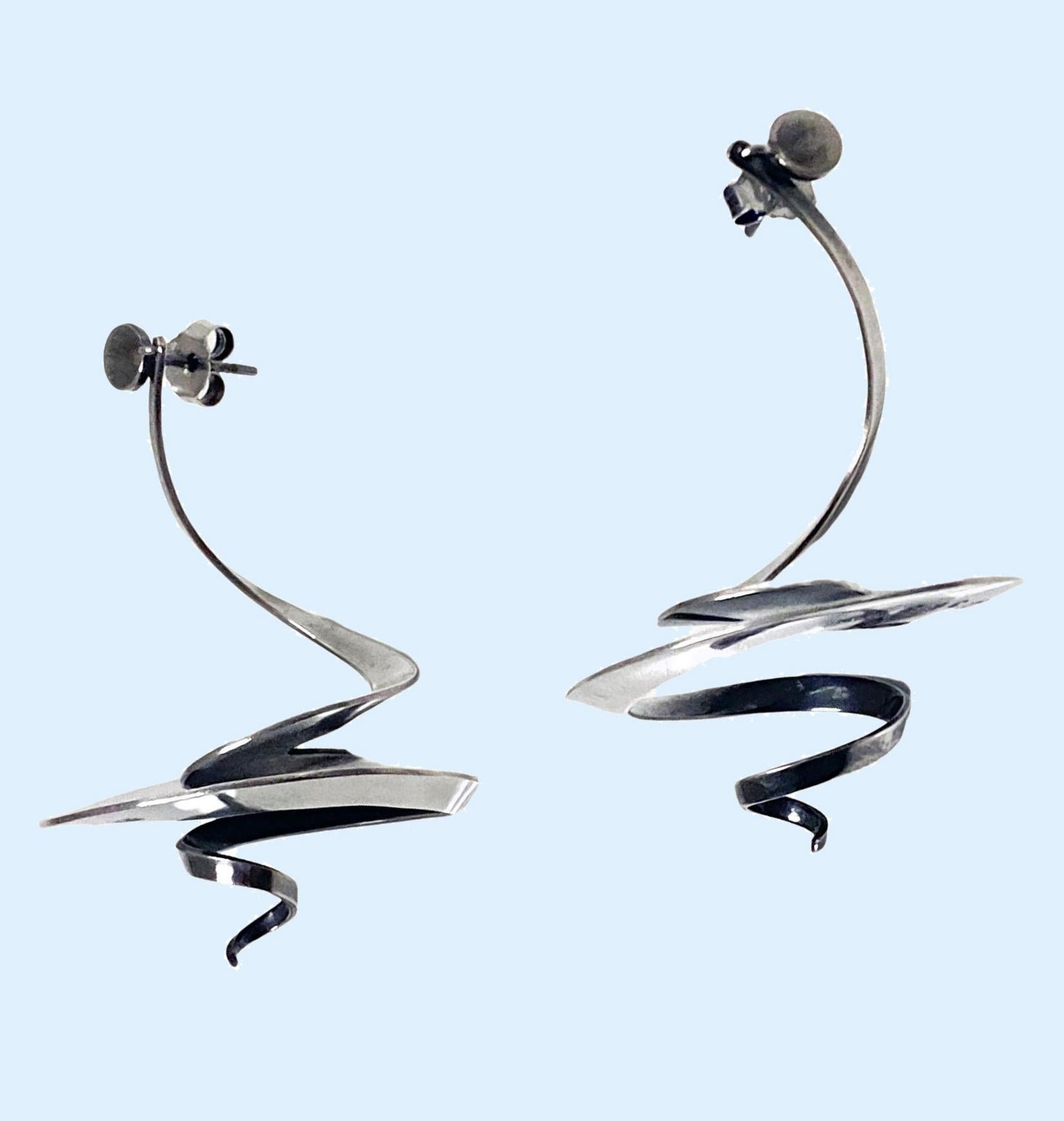 Stunning Georg Jensen Vivianna Torun Bülow-Hübe Sterling Silver Earrings, No 369 for Georg Jensen, Copenhagen, Denmark, 1980's. Hanging double swirls spiral rare large model. Drop: 6 cm. Weight 15.29 grams. Literature Torun, Ann Westin, Ann Westin