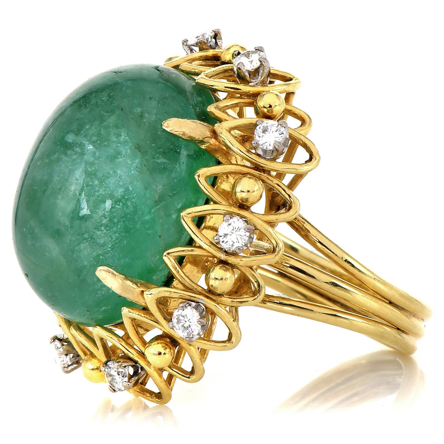 An Open Floral design vintage cocktail ring from the late 1970s.

Crafted in solid 18K yellow gold, the center is adorned by a GIA certified Green Beryl Cabochon Gemstone, Cabochon oval cut, prong set weighing approximately 32.39 carats.

Surrounded