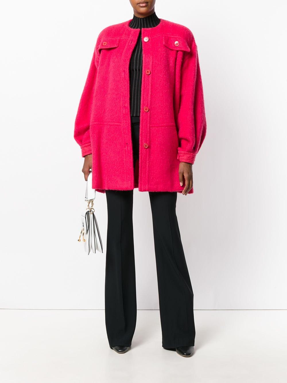 Gianfranco Ferré magenta wool and mohair oversize coat. Crewneck model and front buttoning. Long balloon sleeves, fake flap pockets with button on the chest, two welt pockets with button on the bottom. 
Years: 80s
Made in Italy

Size: 42 IT 
 Flat