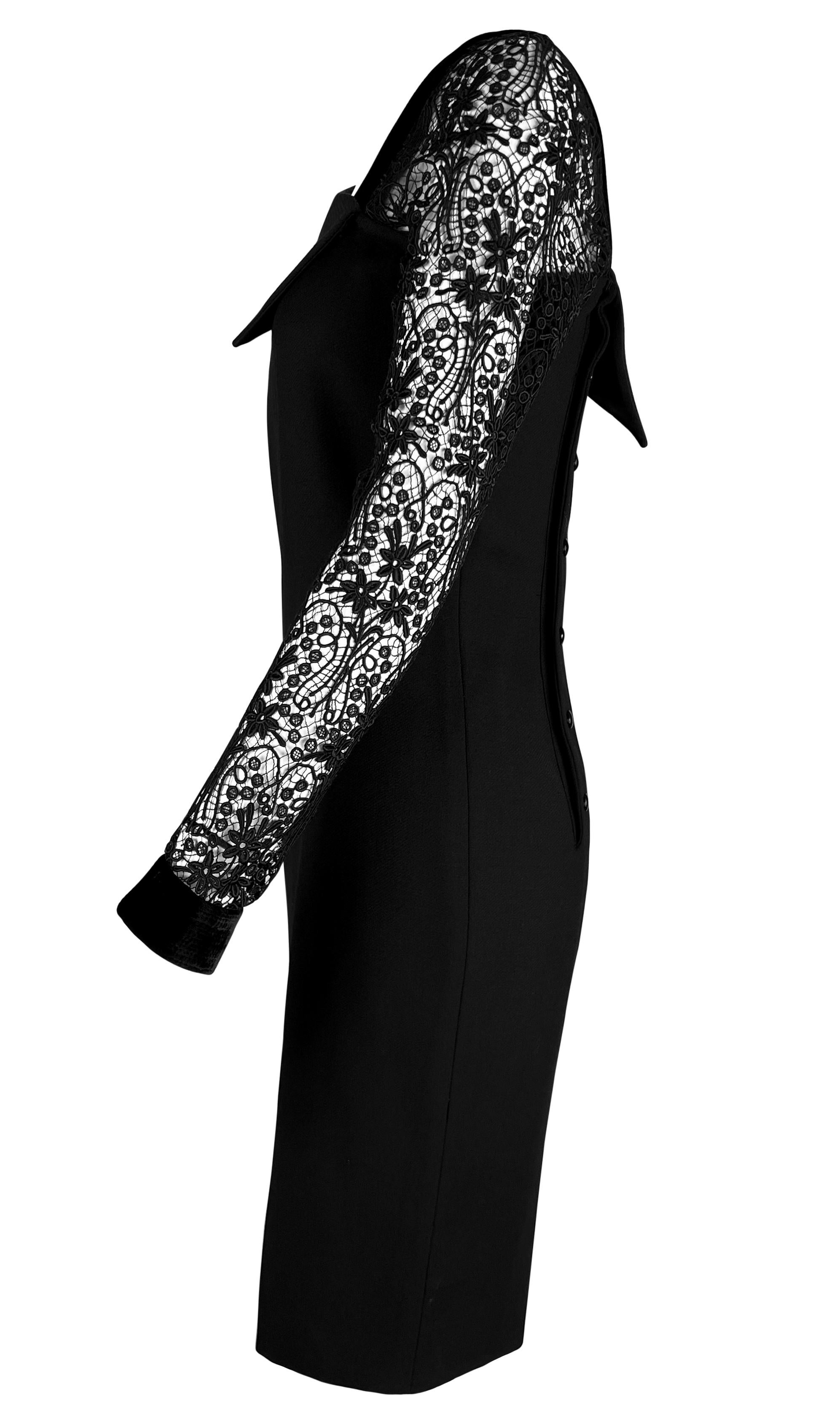 This 1980s Gianni Versace black dress features a wide asymmetrical neckline with one sheer lace sleeve. The sleeve is crafted from intricate floral lace with a velvet cuff, while the opposite side showcases a structured shoulder with velvet trim.