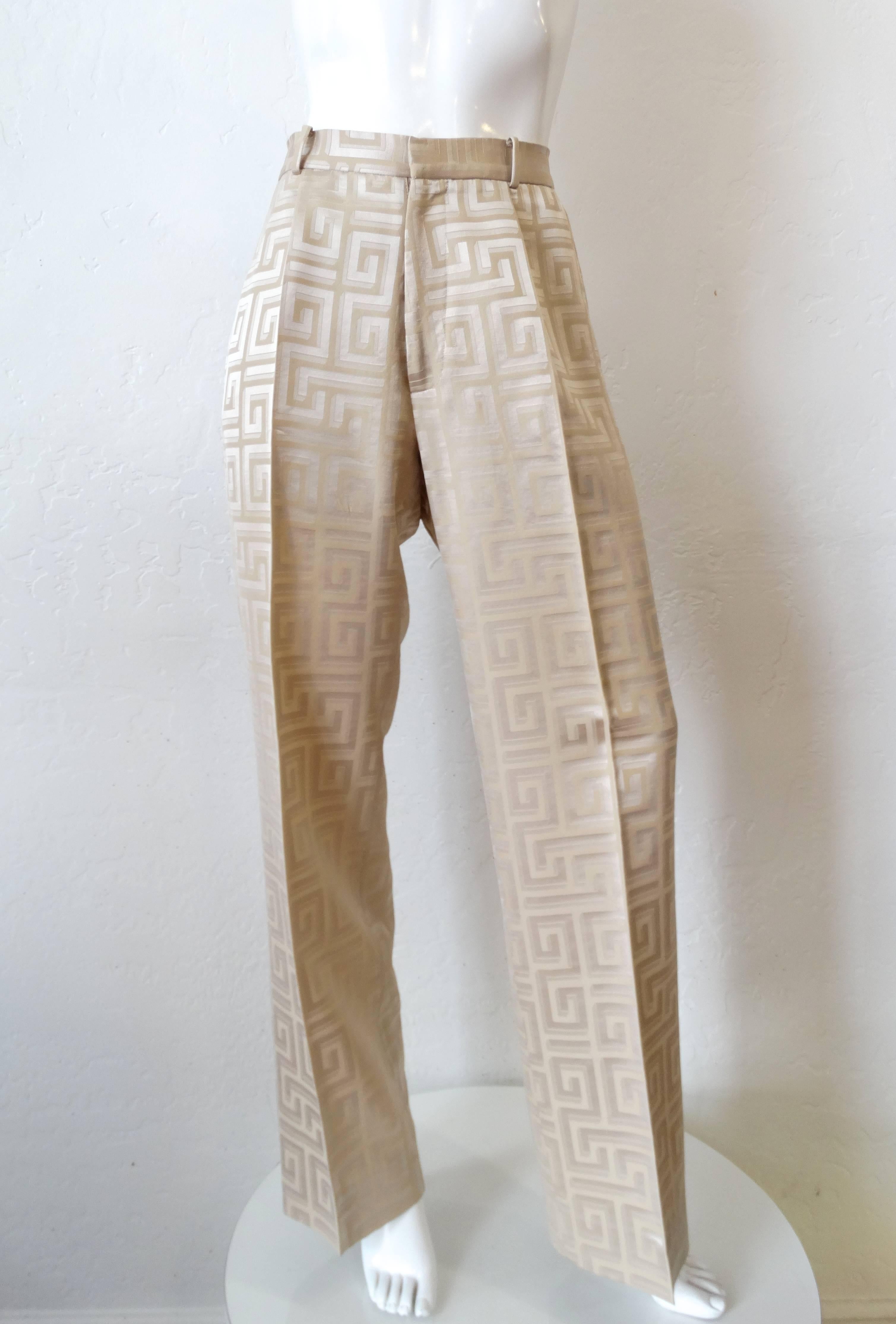 INCREDIBLE 1980s Greek Key printed suit from iconic designer Gianni Versace! Sexy high rise trouser with slightly tapered leg. Matching jacket with standard blazer fit, pockets at either side of the waist. Buttons up the front with gold metal greek