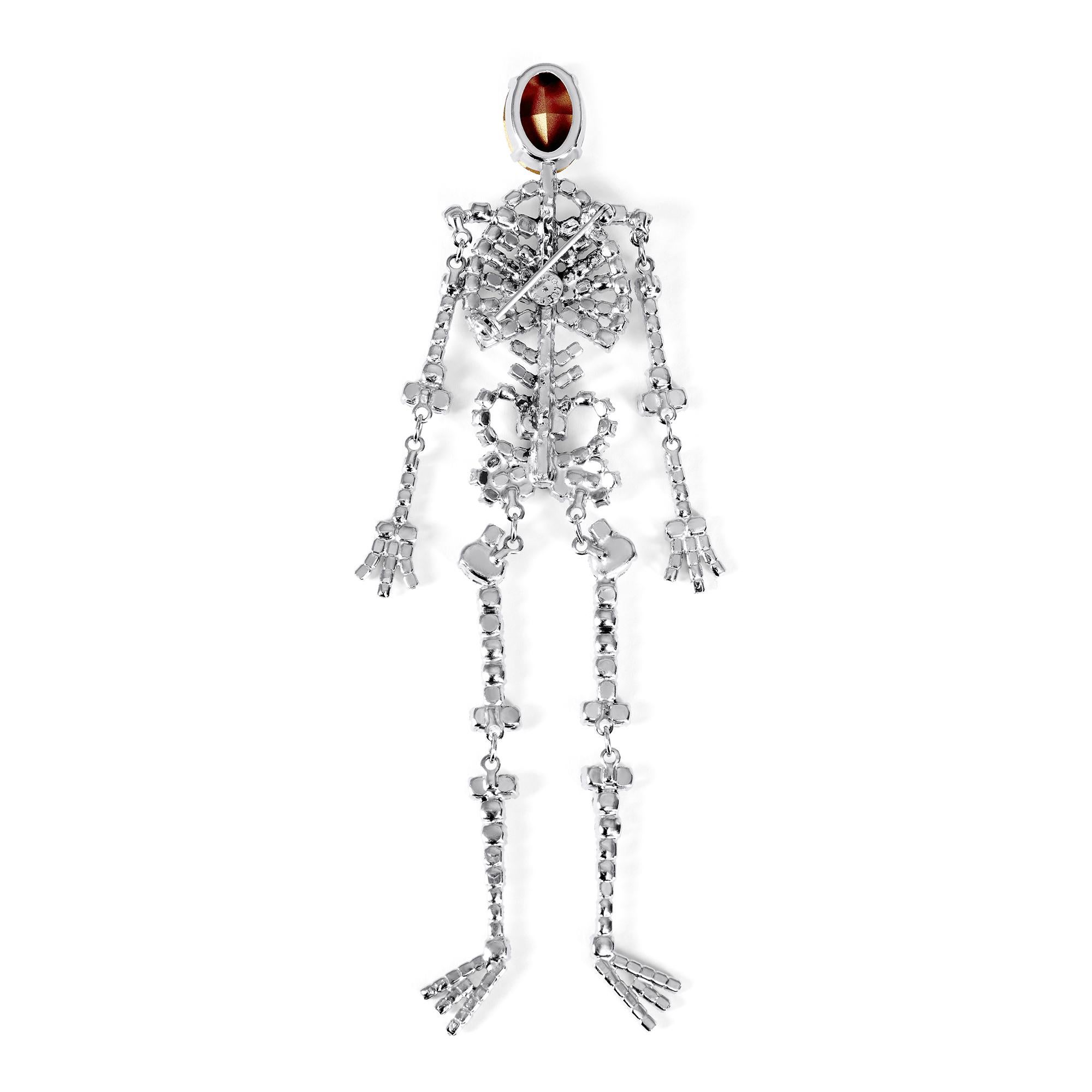 This magnificent original 1980s diamanté skeleton design pin brooch is by celebrated British costume jewellery designers Butler & Wilson (see notes) and is in impeccable vintage condition.  Over 15 cm long, it is a very sizeable statement piece. The