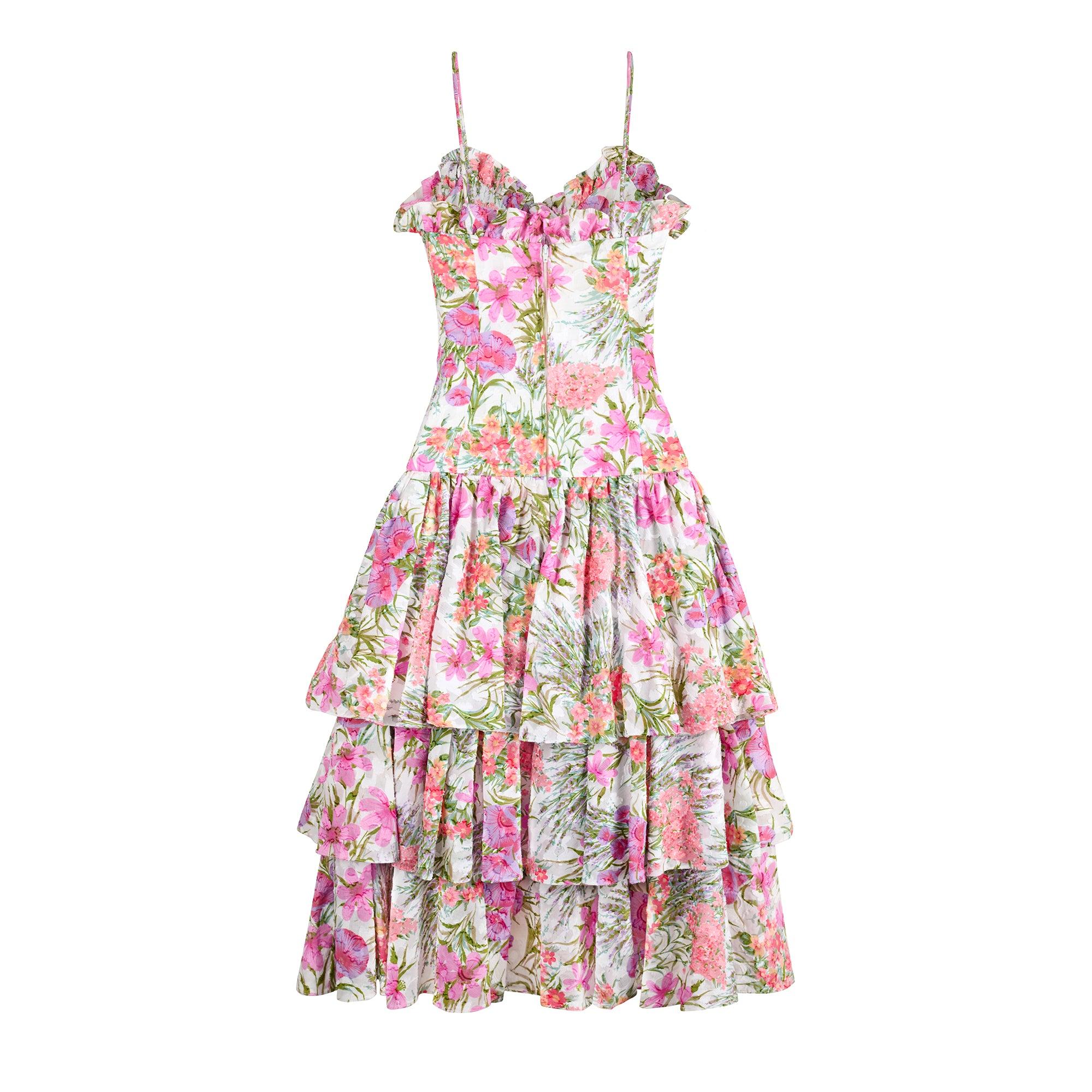 Dieses in England gefertigte, verspielte Sommerkleid wurde von Gina Fratini Mitte bis Ende der 1980er Jahre entworfen und ist damit einer der letzten Entwürfe ihrer Karriere. Gina war in den späten 1960er Jahren bis in die 1970er Jahre hinein für
