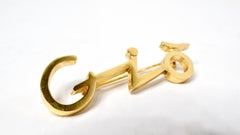 Giorgio Armani Broche « Gio » en plaqué or des années 1980