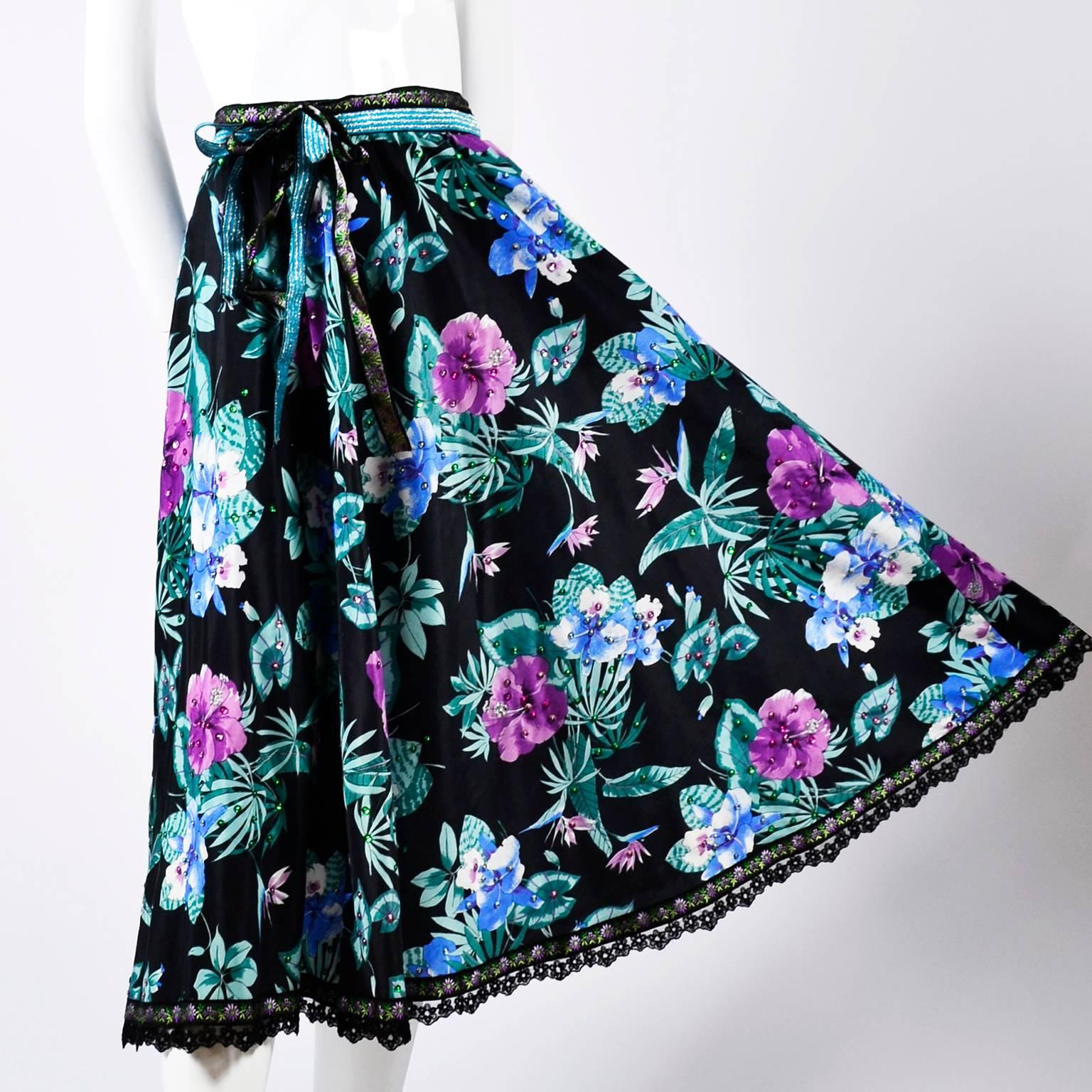This floral cotton vintage skirt was designed by Giorgio di Sant' Angelo and is embellished with colorful sequins and trimmed at the hemline with lace and embroidered ribbon.  The skirt was purchased at I Magnin in the late 1980's and has its