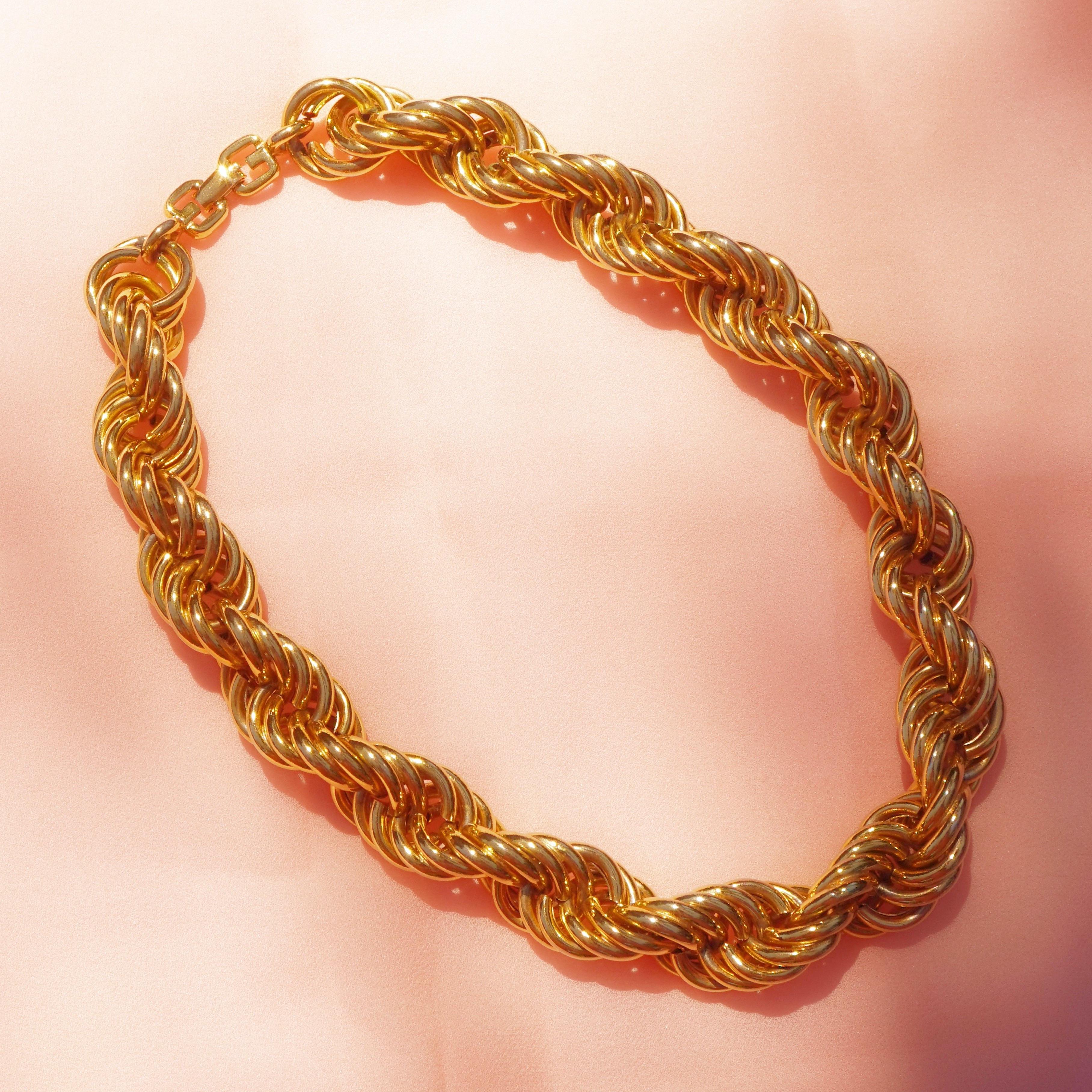 gold chain with g on clasp