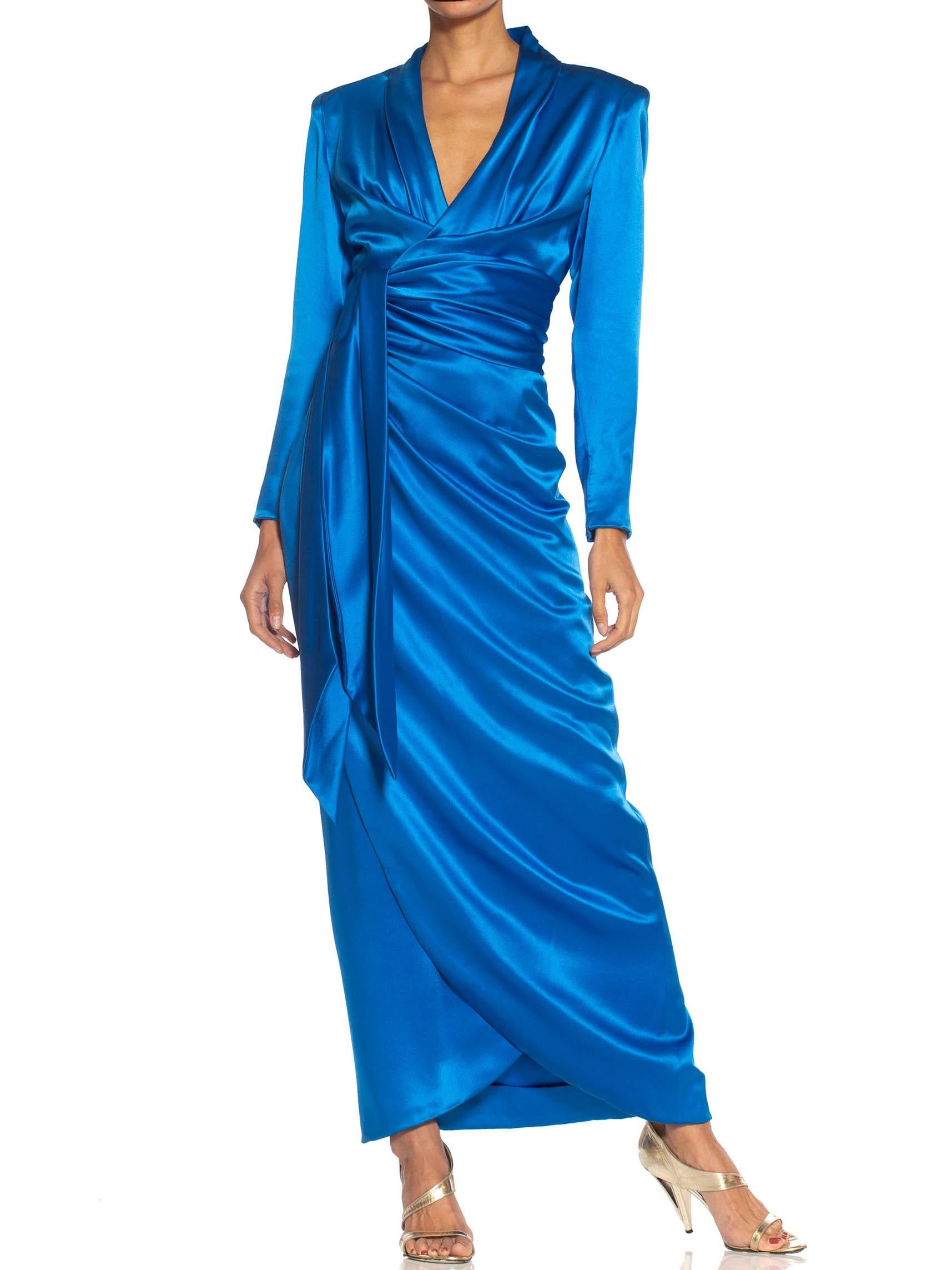 in near perfect condition, few very slight areas of abrasion to the satin. 1980S GIVENCHY Electric Blue Haute Couture Silk Double Faced Satin Sleeved Gown With Slit & Sash 