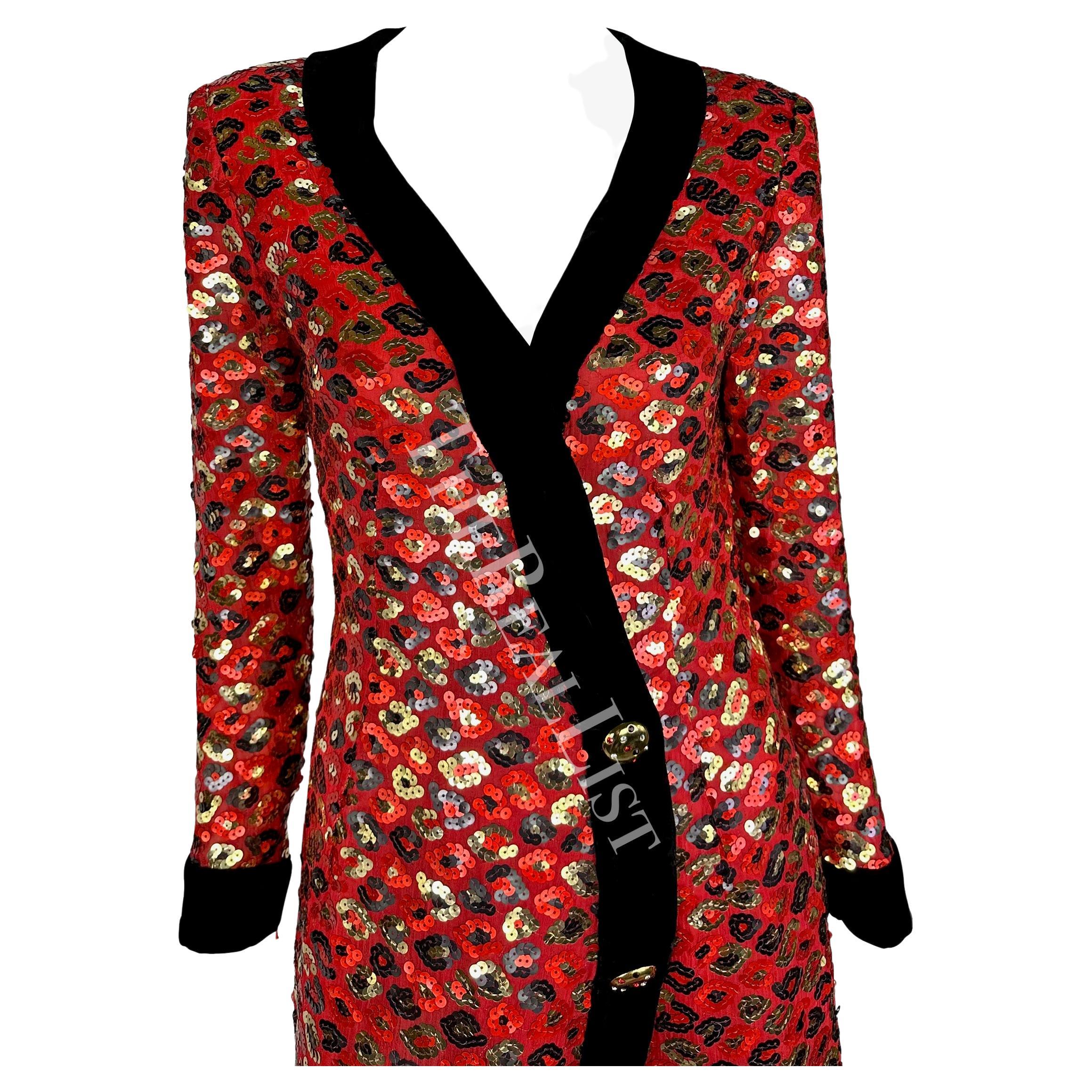 Presenting a stunning red sequin cheetah print Givenchy wrap dress. Designed by Hubert de Givenchy in the 1980s, this chic dress is covered in a multicolor cheetah sequin pattern and is made complete with black velvet trim finishes at the neckline,