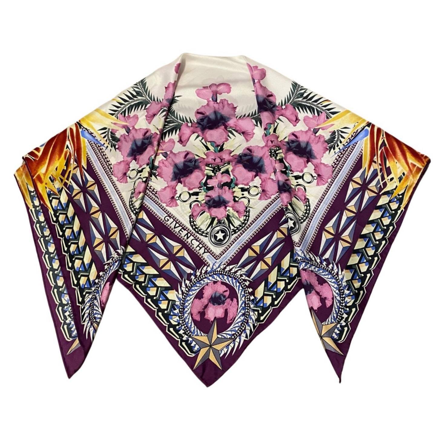 Givenchy babushka scarf featuring multicolor floral print and geometric pattern, large so it can be worn as babushka too, made of silk. 

Condition: 1980s, very good, minimal wear 

Dimensions: 75x75cm / 29.5x29.5in 