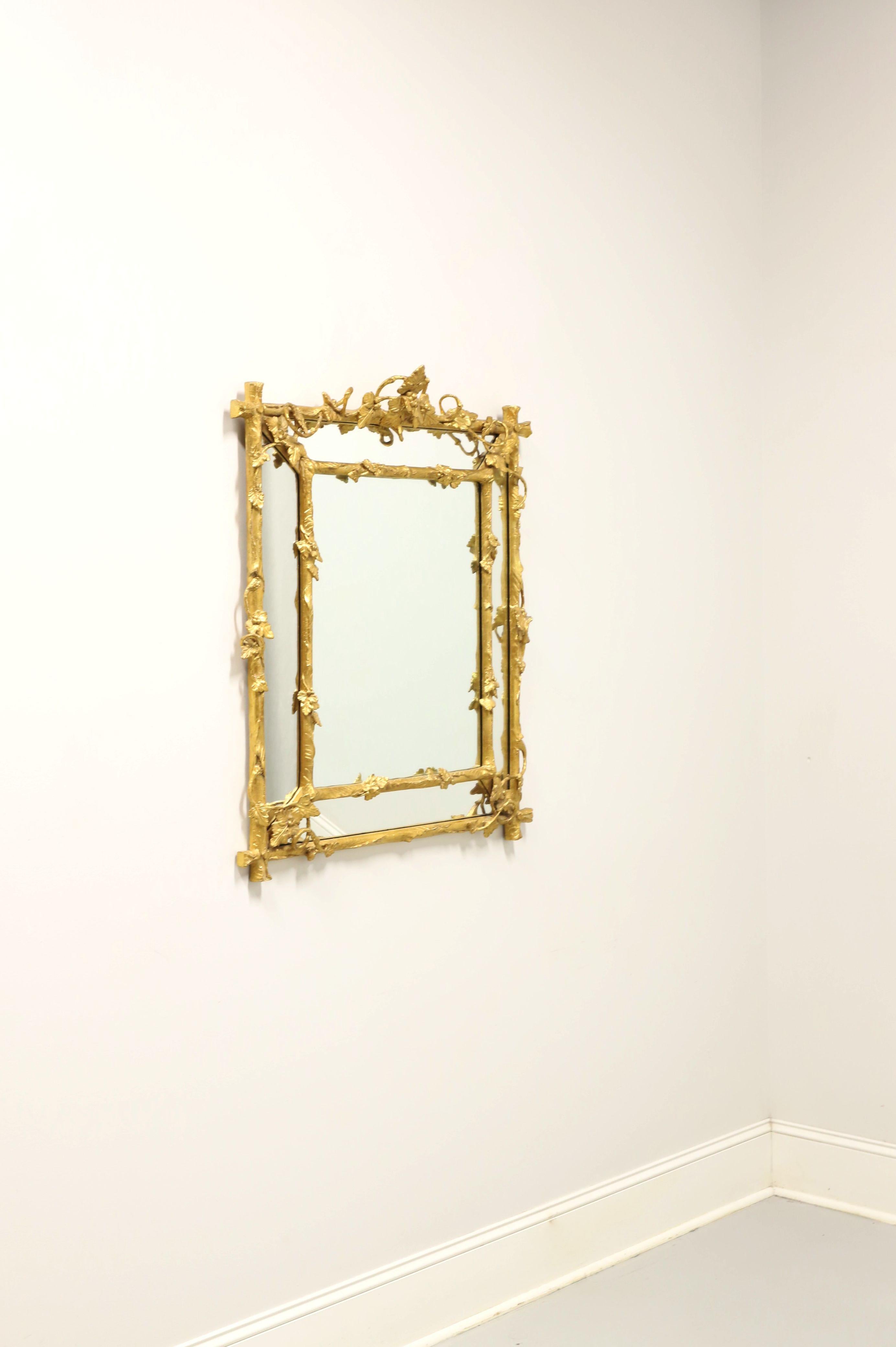 A parclose wall mirror in the French Louis XV Rococo style, unbranded, similar quality to Friedman Brothers. Mirror glass in an intricately carved gold gilt painted wood frame with large strips of mirrors surrounding the outer edges. Features a