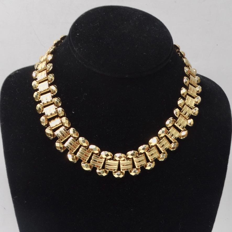 Get your hands on this incredible 1980s 18K gold plated choker style necklace! The most unique arrangement of mid century style gold plating comes together to create this gorgeous and eye catching necklace. This is the perfect necklace to throw on
