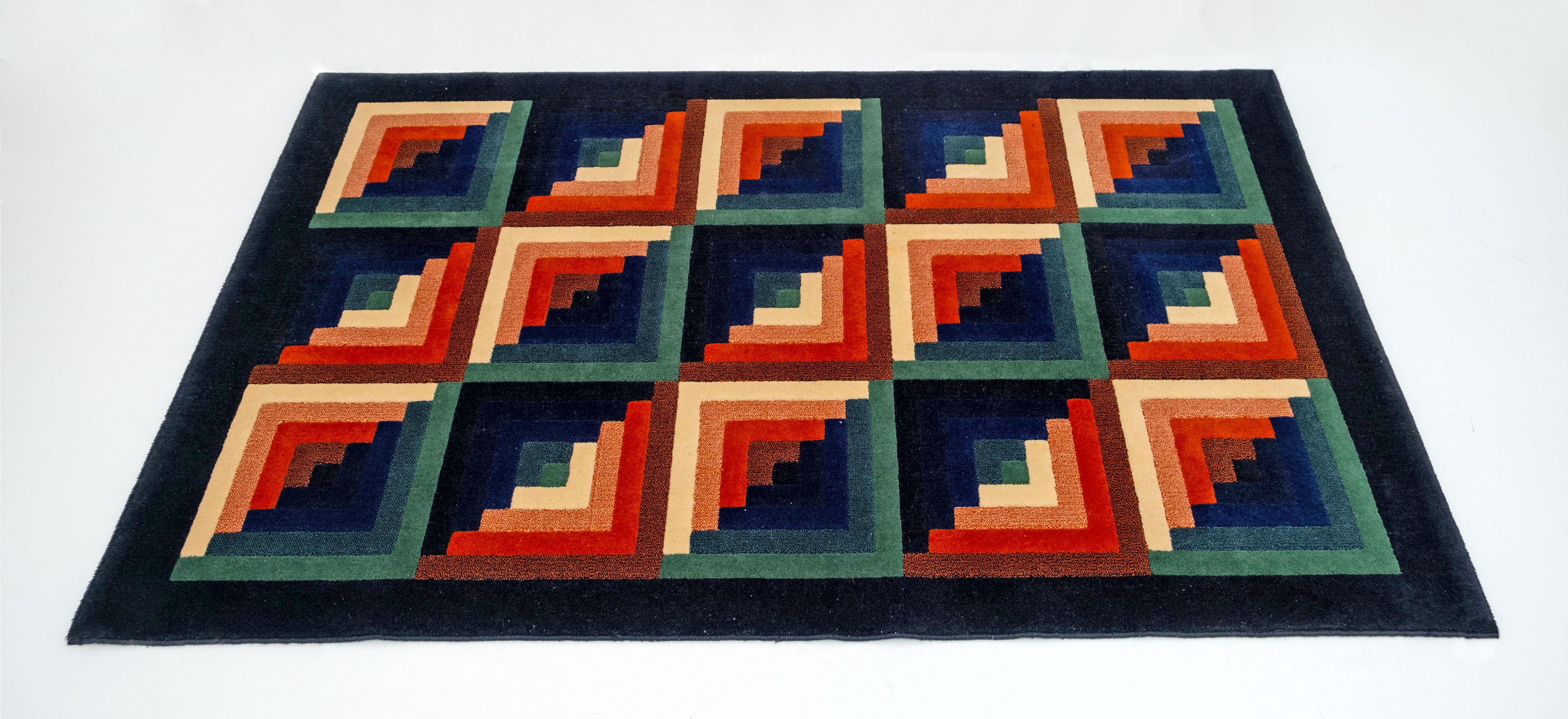 This vintage Ottavio Missoni carpet was made in the 1980s in pure virgin wool by the T&J Vestor company, founded in 1921 by Rosita Missoni, and now acquired by Missoni Home. this beautiful optical carpet features geometric motifs that form squares