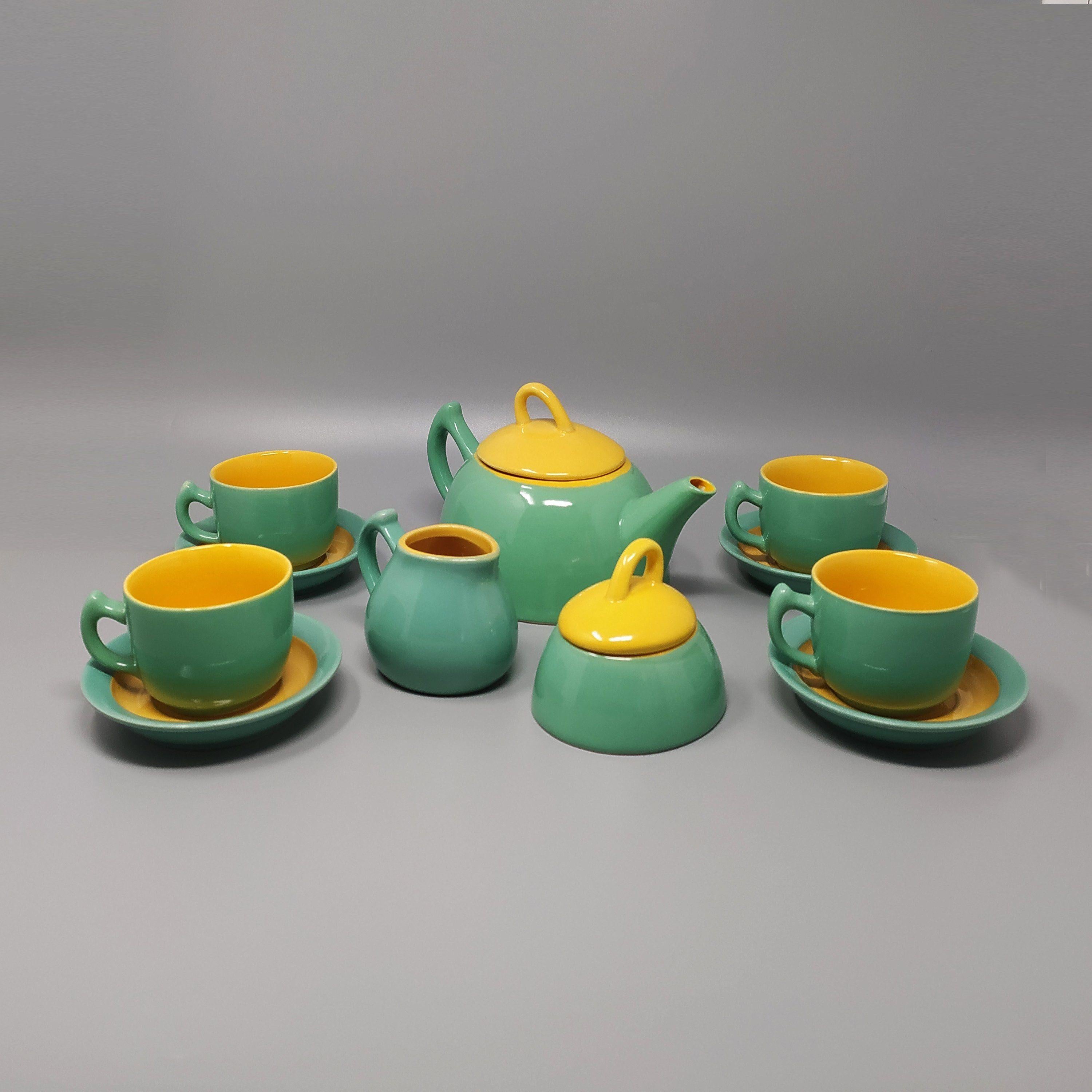 1980s Gorgeous Green and Yellow Tea Set/Coffee Set in Ceramic by Naj Oleari. Made in Italy. The items are in excellent condition

- 1 Coffee/Tea pot 9,05