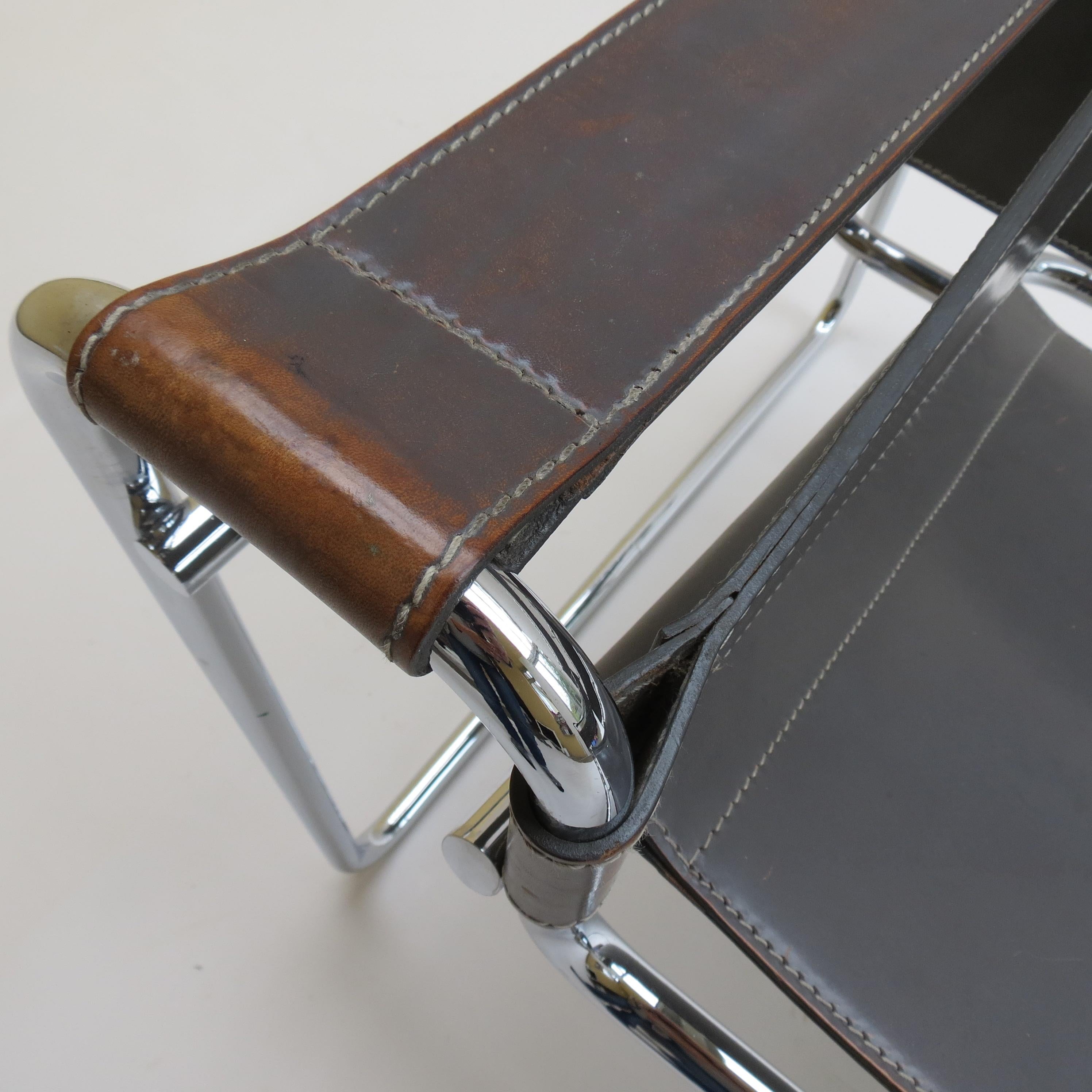 Wassily chair designed by Marcel Breuer and manufactured by Knoll. The original year of design of this chair was 1925, this particular chair was manufactured in 1985.

Made from polished chrome tube with leather seat and arms. There is Wear and