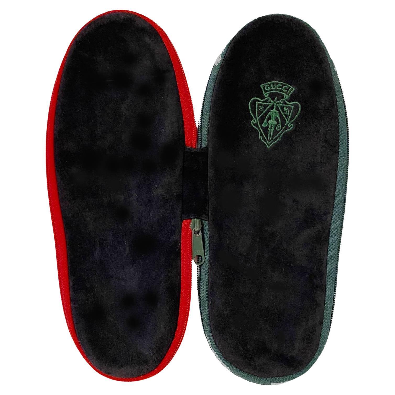 1980s Gucci Black Suede Slippers Travel zipped case,  This travel case serves as a fashionable way to protect your essentials while on the go. The timeless style of Gucci's classic black suede is sure to be admired.

Condition: 1980s, vintage, very