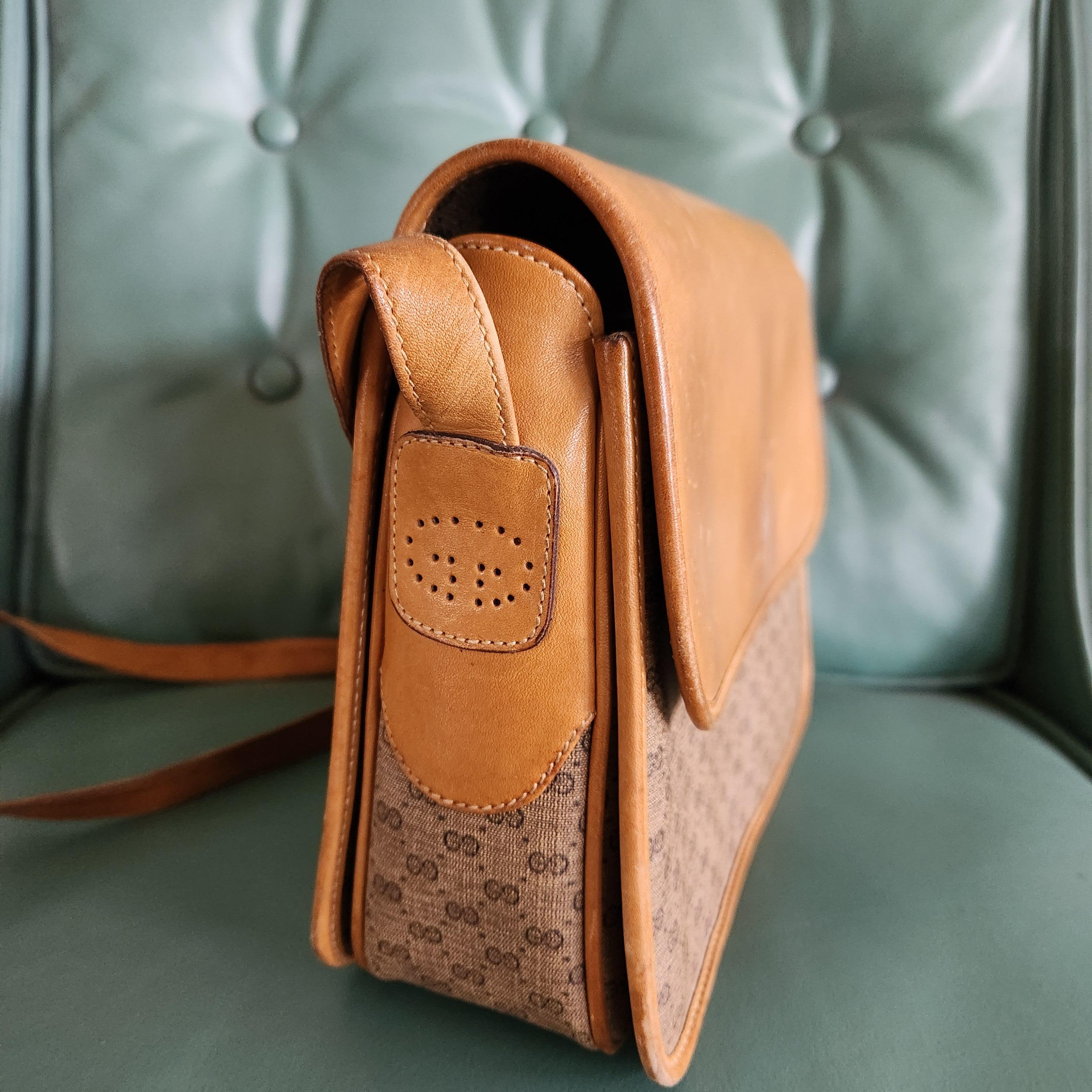 AMBIANIC presents
1980s Authentic Gucci Monogram Crossbody Shoulder Bag
Micro GG monogram Coated Canvas Tan Leather
stamped Italy
3 interior sections and 1 inner zippered pocket
9.5W x 7.5T x 3D
Unrestored original vintage condition signs of