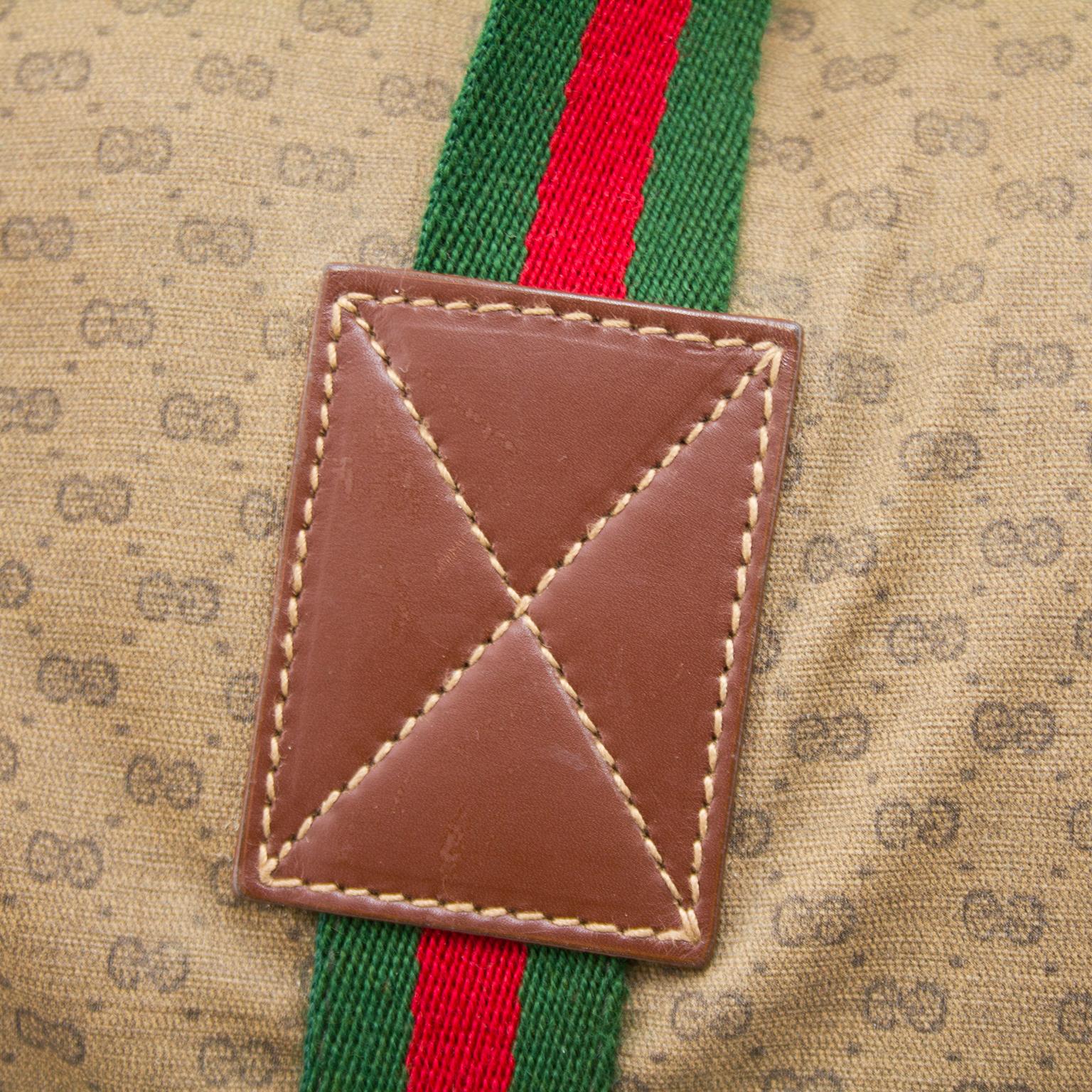 red gucci duffle bag