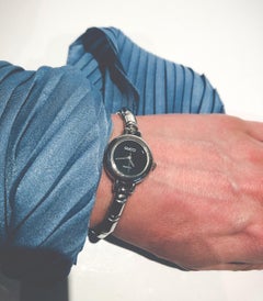 Reloj de pulsera Gucci Round Face Bamboo Steel de los años 80