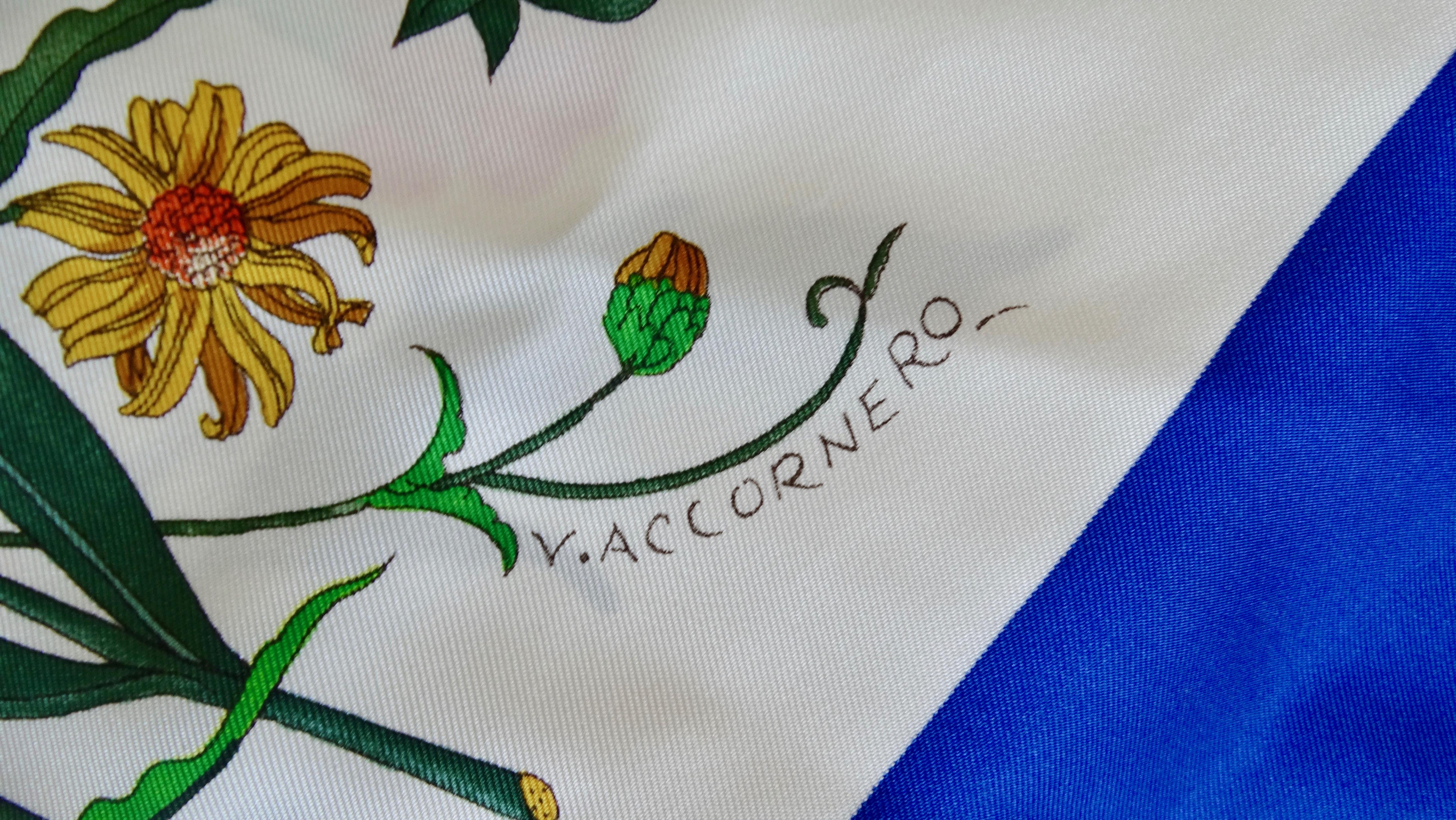 We Will Never Be Over Gucci Flora! Circa 1980s, this Gucci scarf features the iconic flora print which includes a variety of flowers, dragonflies, butterflies, and beetles. Includes a vibrant royal blue trim and rolled edges. Is signed Gucci in the