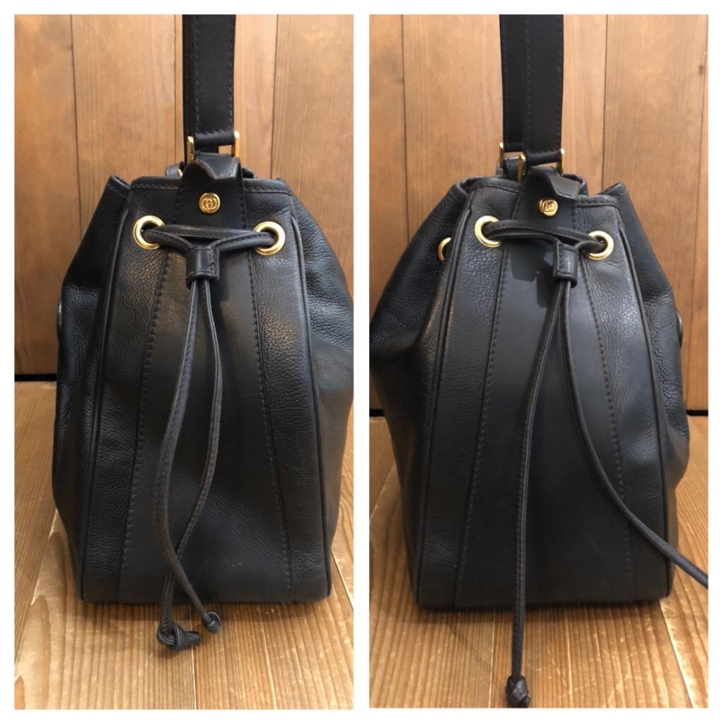 black bucket bag with red interior