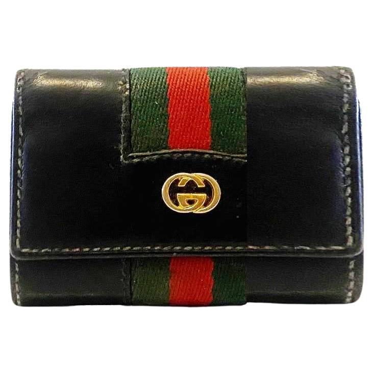 Porte-clés à crochet en cuir noir Gucci des années 1980 en vente