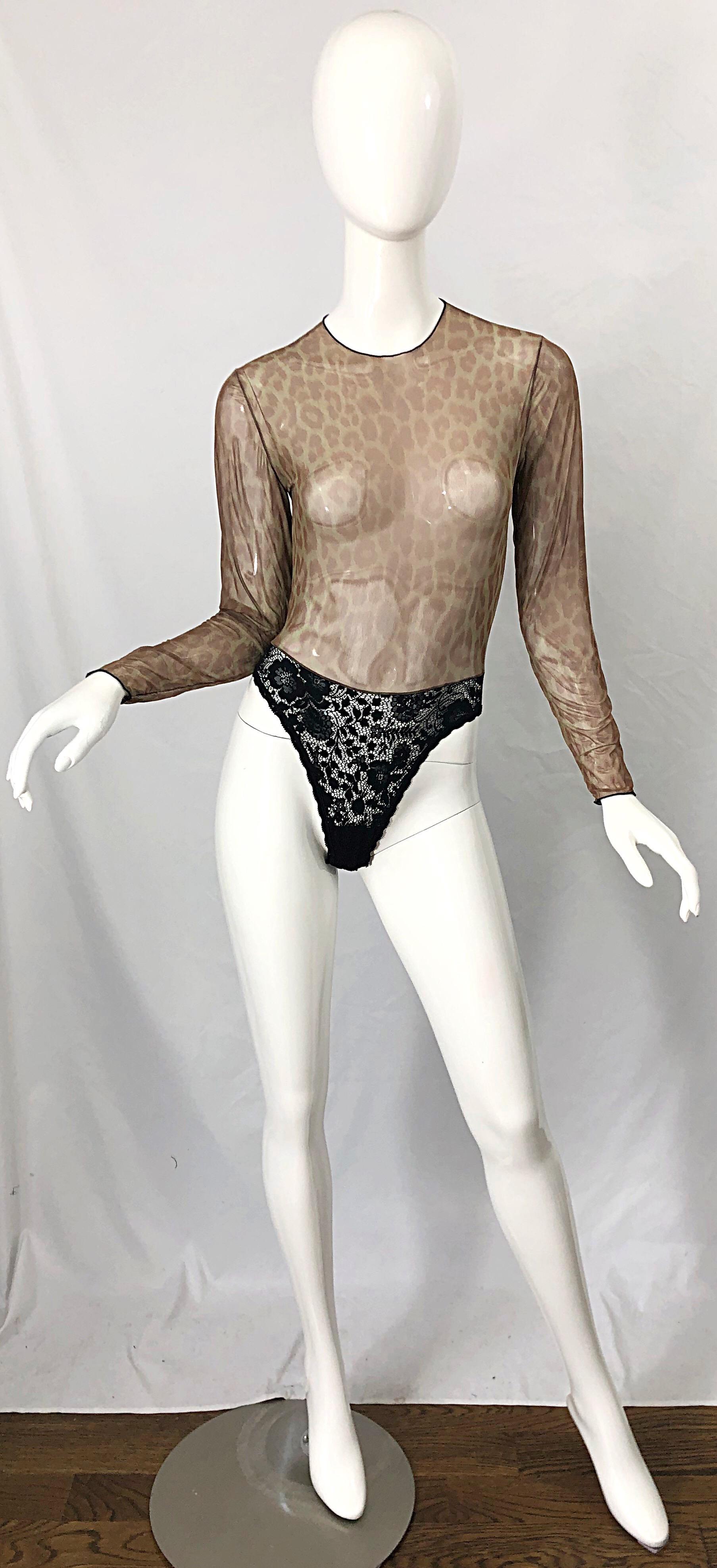 Sexy 1980s GUY LAROCHE semi sheer leopard animal print one piece mesh and lace bodysuit ! Features a classic leopard print in brown and tan. Button closure at center back neck. Can easily be dressed up or down. Pair with jeans, trousers, shorts, or