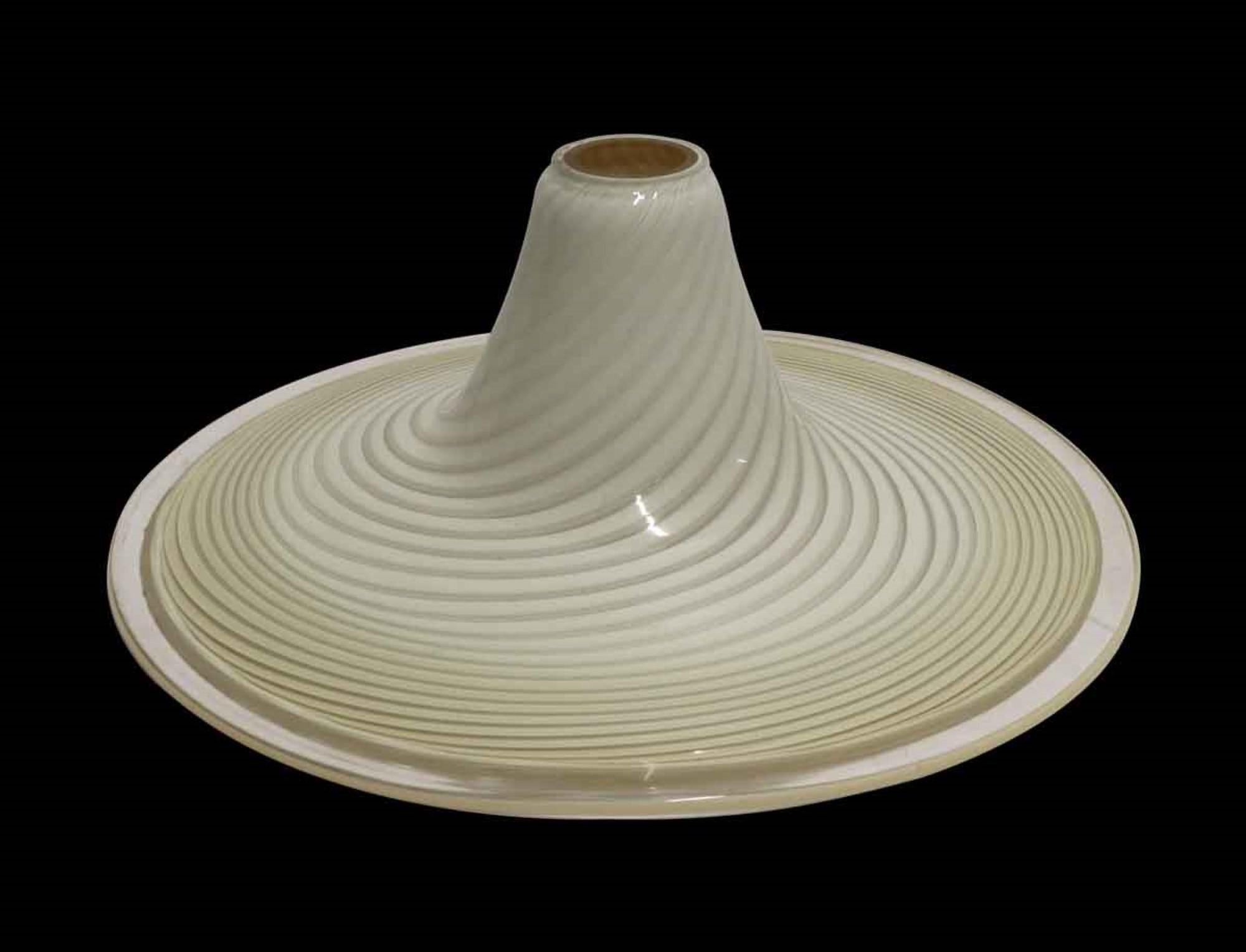 1980s murano glass shade hand blown in Italy. Alternating white and tan swirls. This can be seen at our 400 Gilligan St location in Scranton, PA.