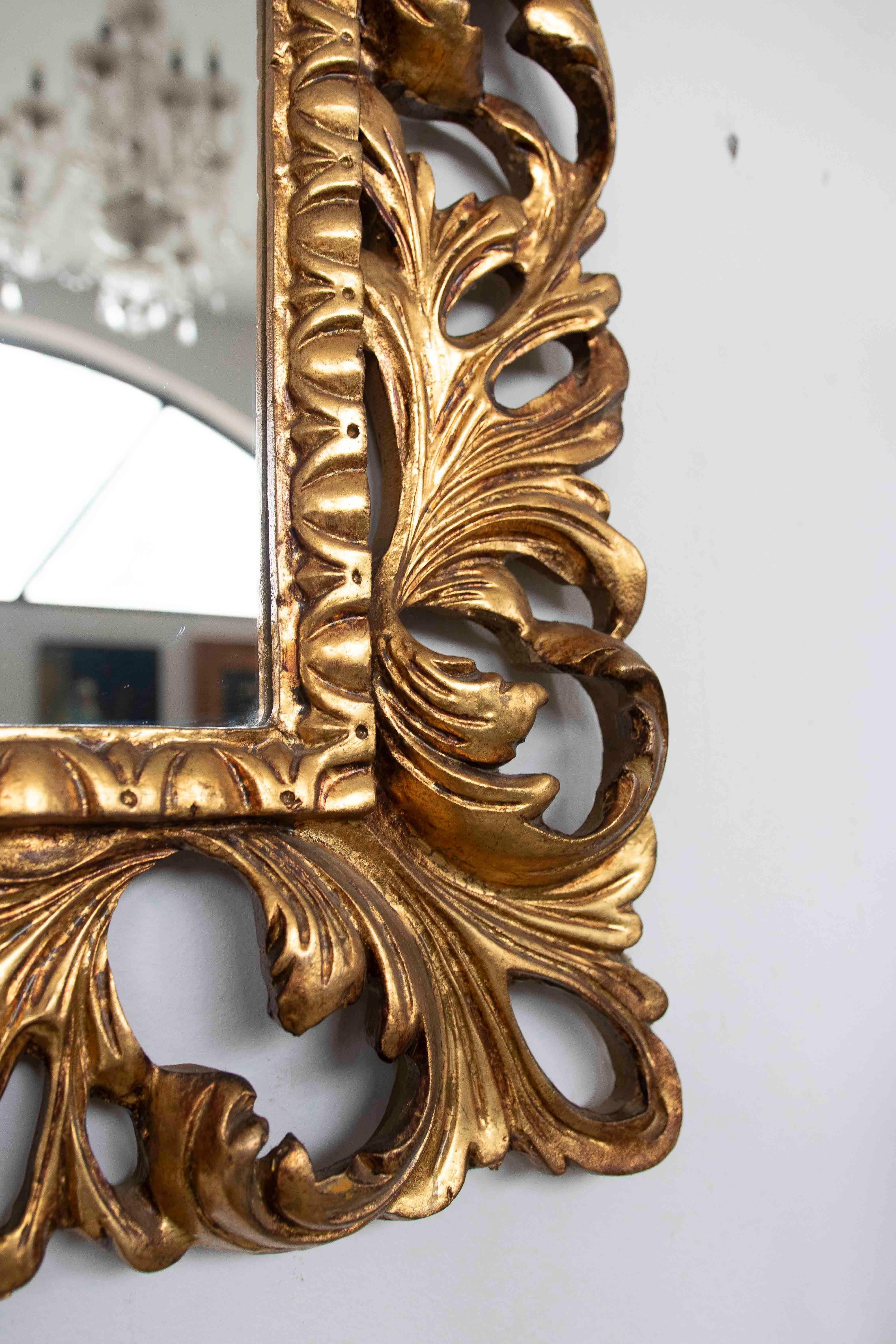 Wood 1980s Hand-carved Gilded Baroque-style Mirror with Openwork Frame For Sale
