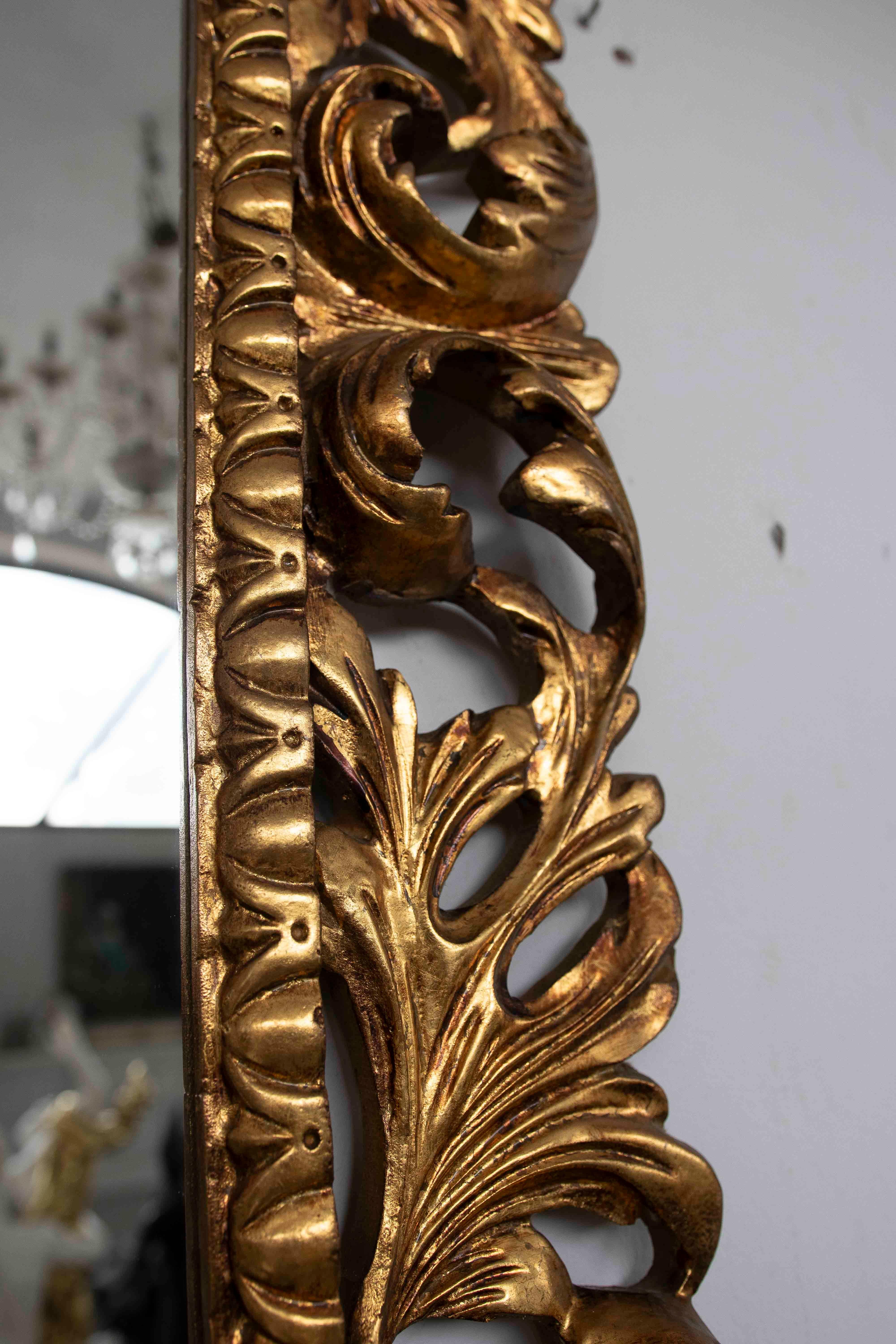 1980s Hand-carved Gilded Baroque-style Mirror with Openwork Frame For Sale 1