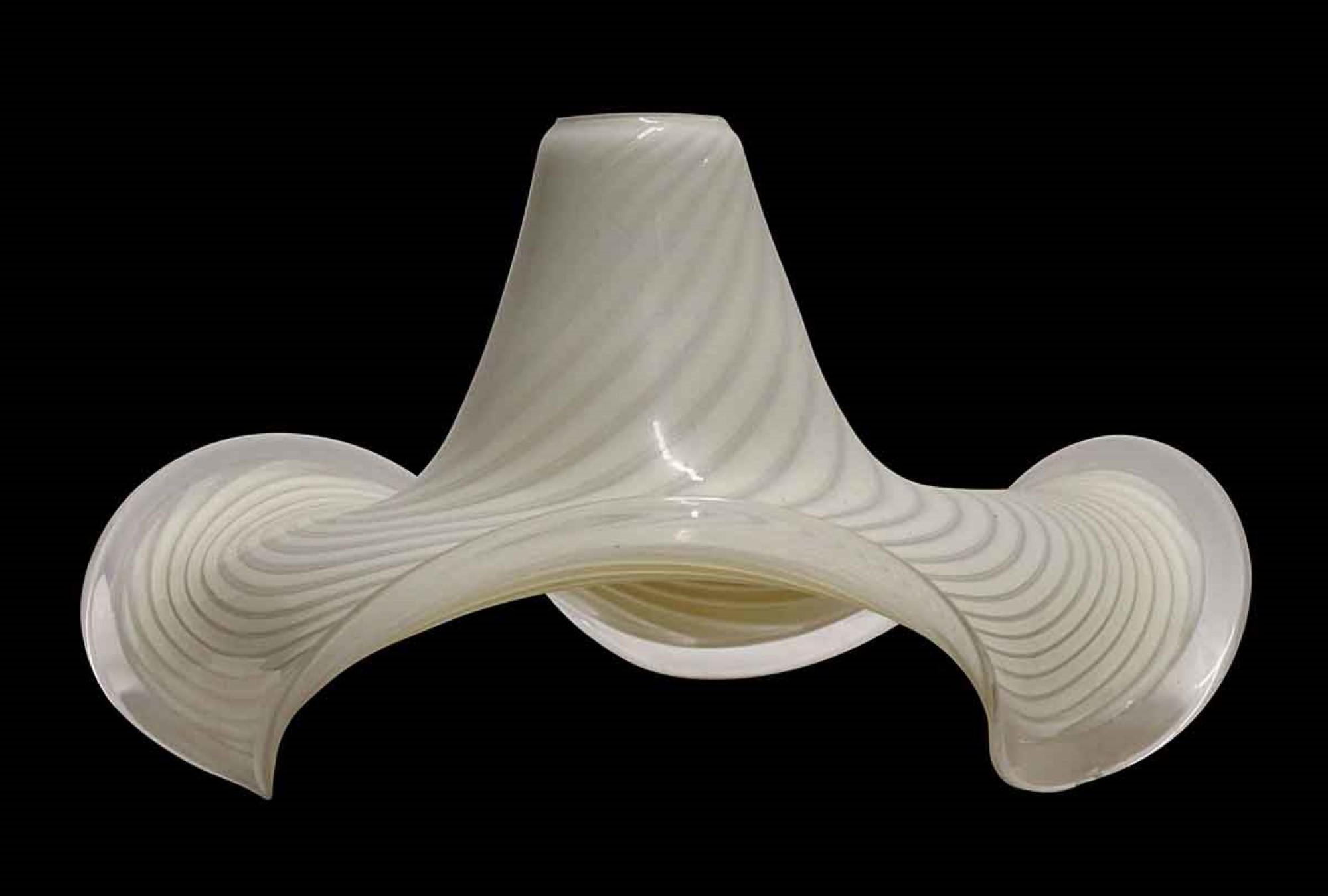 Hand blown in Italy in the 1980s, this Mid-Century Modern Murano glass shade accepts a 3.25-inch diameter fitter. This can be viewed at our Scranton, Pennsylvania location. Please inquire for the exact address.