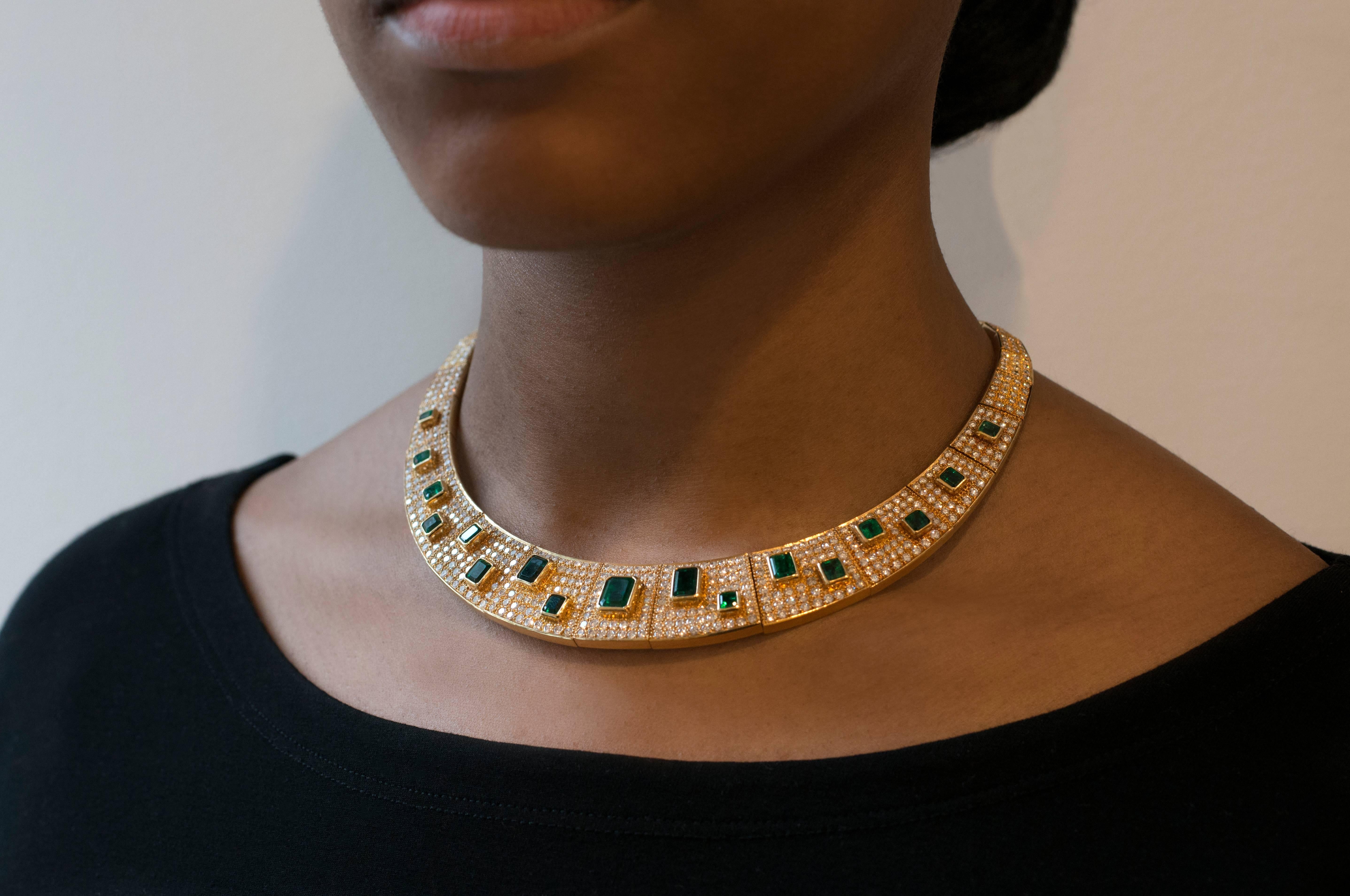 An emerald, pavé-set diamond and 18 karat gold necklace, by the famed Brazilian modernsit jewelry designer, Haroldo Burle Marx, c. 1980. 

The necklace has approximately 15 carats of pavé set diamonds total and over 18 carats of square and