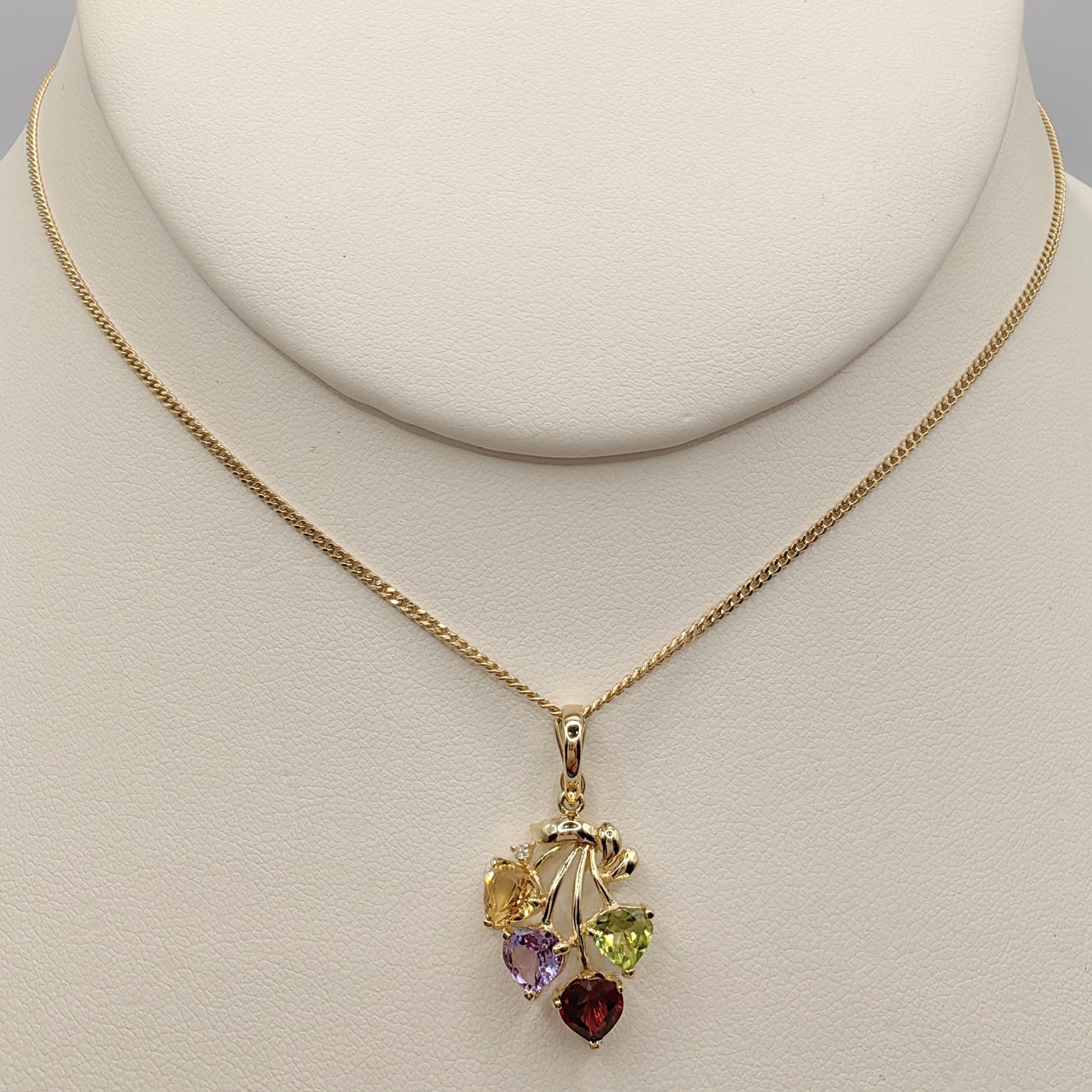 Introducing our delightful 80's Heart Shaped Amethyst, Citrine, Garnet, Peridot 14K Gold Necklace Pendant. This dainty and colorful pendant showcases a charming blend of heart-cut amethyst, citrine, garnet, and peridot gemstones, each measuring