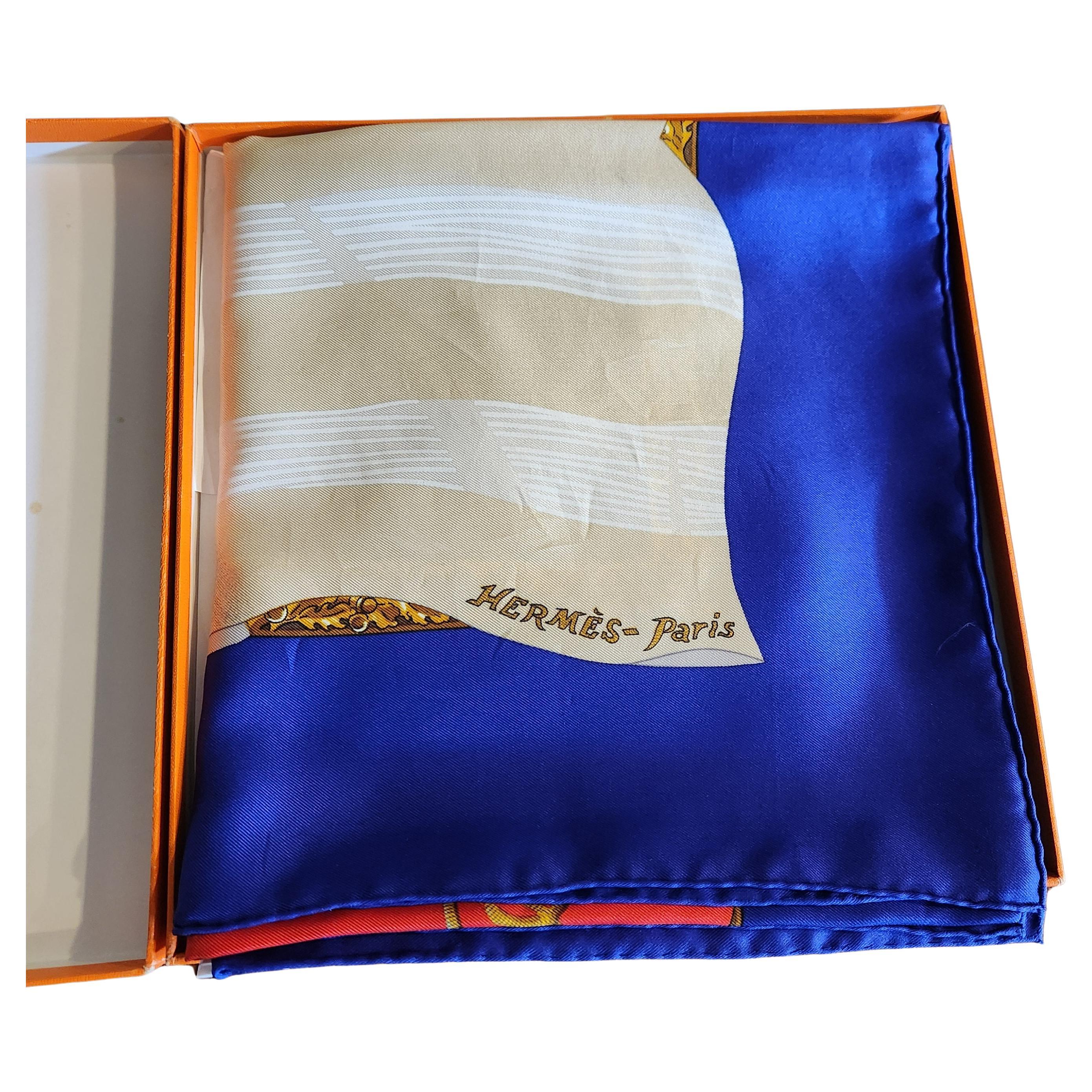 AMBIANIC presents
1980s New Vintage Hermès-Paris Silk Scarf in original box.
Hermès Silk Scarf Hilton McConnico Souvenirs de Paris 35 inches
designer Joseph Hilton McConnico 
approximately 35 inches
Stamped Hermes Paris Souvenirs
Preowned original
