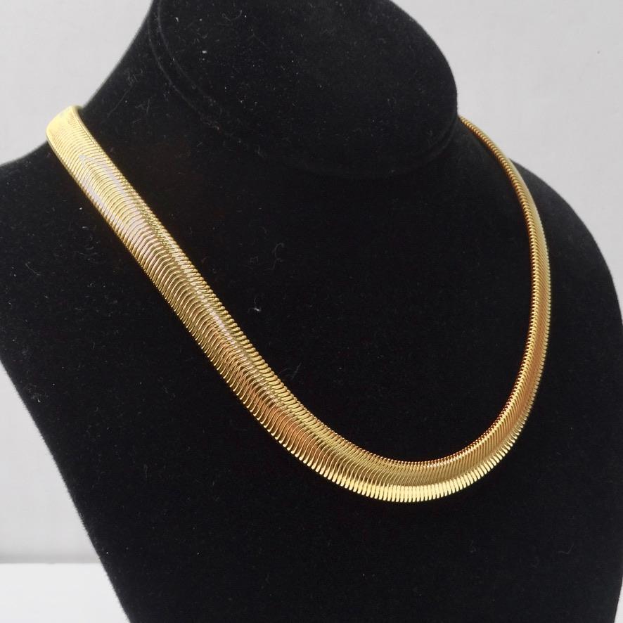 Classic herringbone style choker necklace circa 1980s! Giant omega 18K gold plated choker in a gorgeous yellow gold shade. This is such an elegant way to elevate any look, notice how shiny this gold plating is when it catches the light! Let this