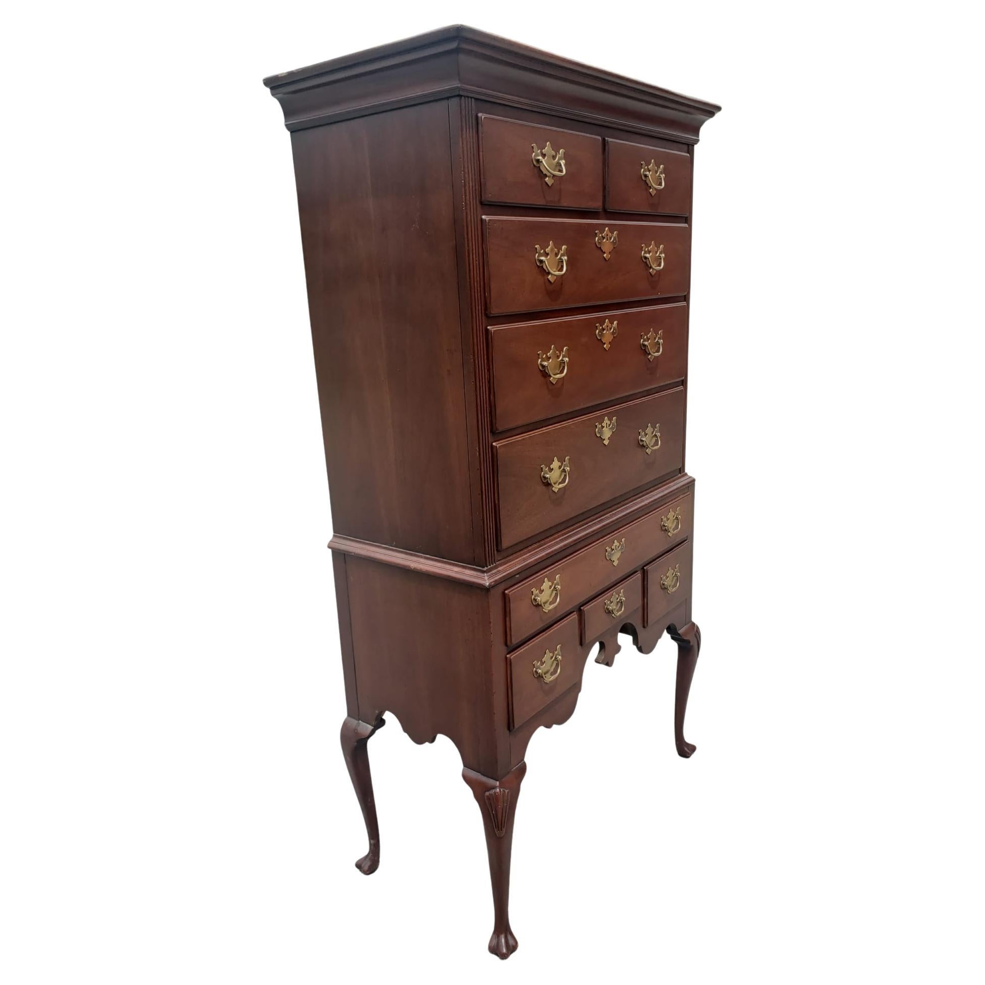 Hickory chair vintage mahogany chippendale style flat top highboy. Very good vintage condition. All dovetailed drawers opening and closing as originally intended. Measures 38.75 inches in width, 19.75 inches in depth and stand 72.25 inches tall.