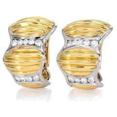 1980s High Polish Diamond 18K Gold Statement clipon Earrings