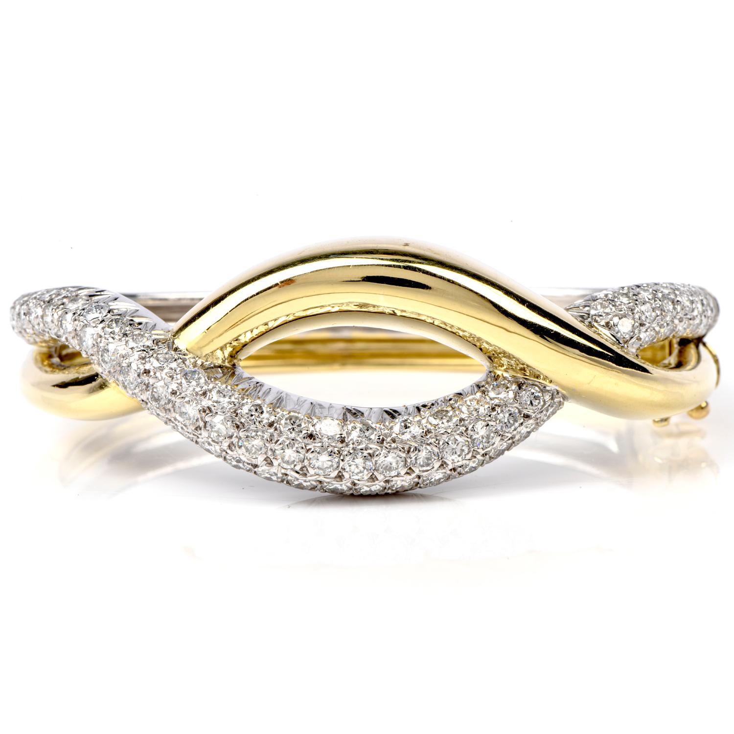 For the Fashionista!
Want to mix the colors of jewelry today with bright
Yellow and white? 
This free form 18K yellow gold and
White gold bracelet features an expansive swath of yellow
Gold swooping through the bracelet.  In an almost wrapping
And