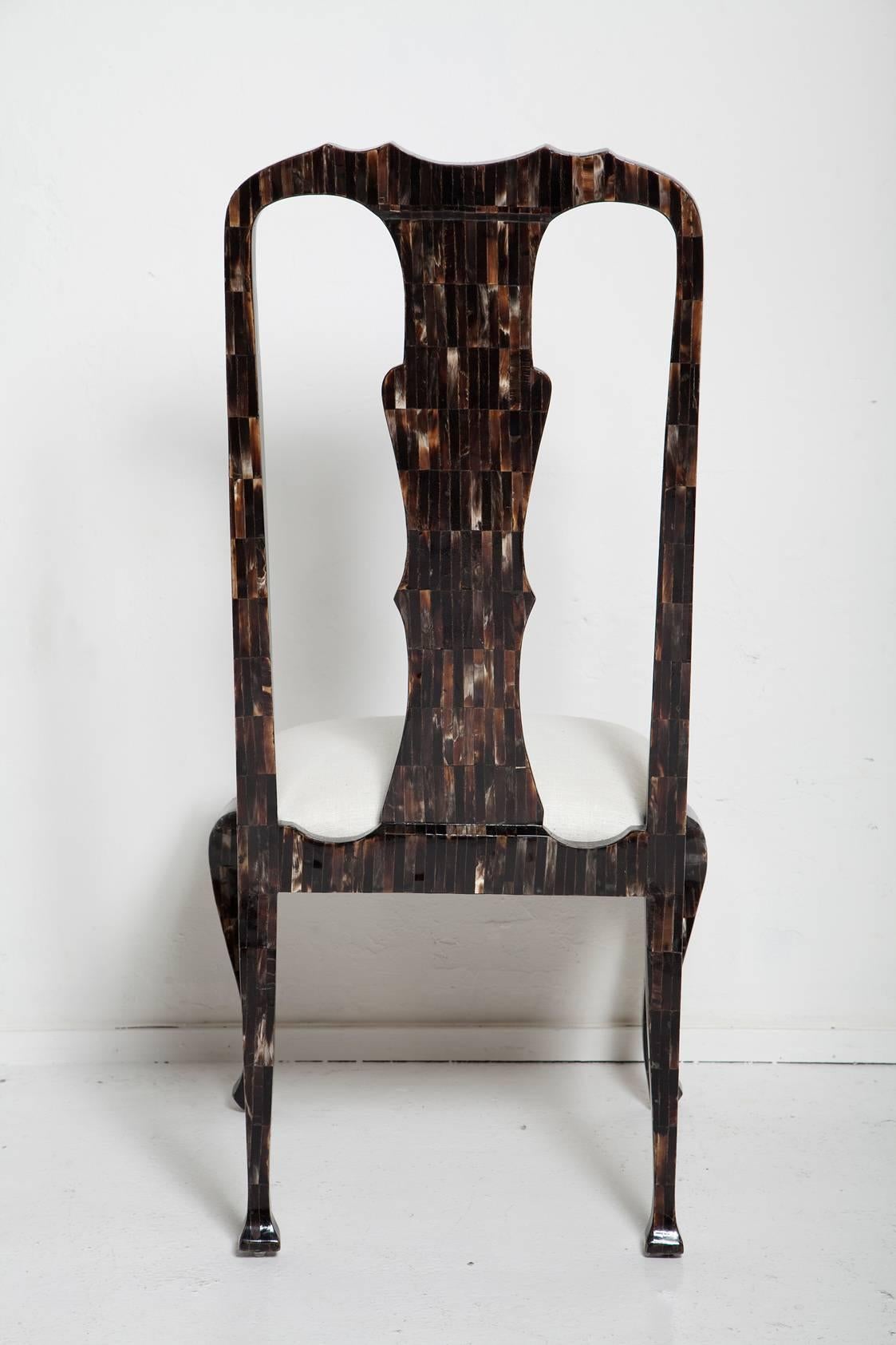 Chippendale form meets 1980s fabrication with this gorgeous horn tile chair by Enrique Garces, upholstered in cream natural silk.