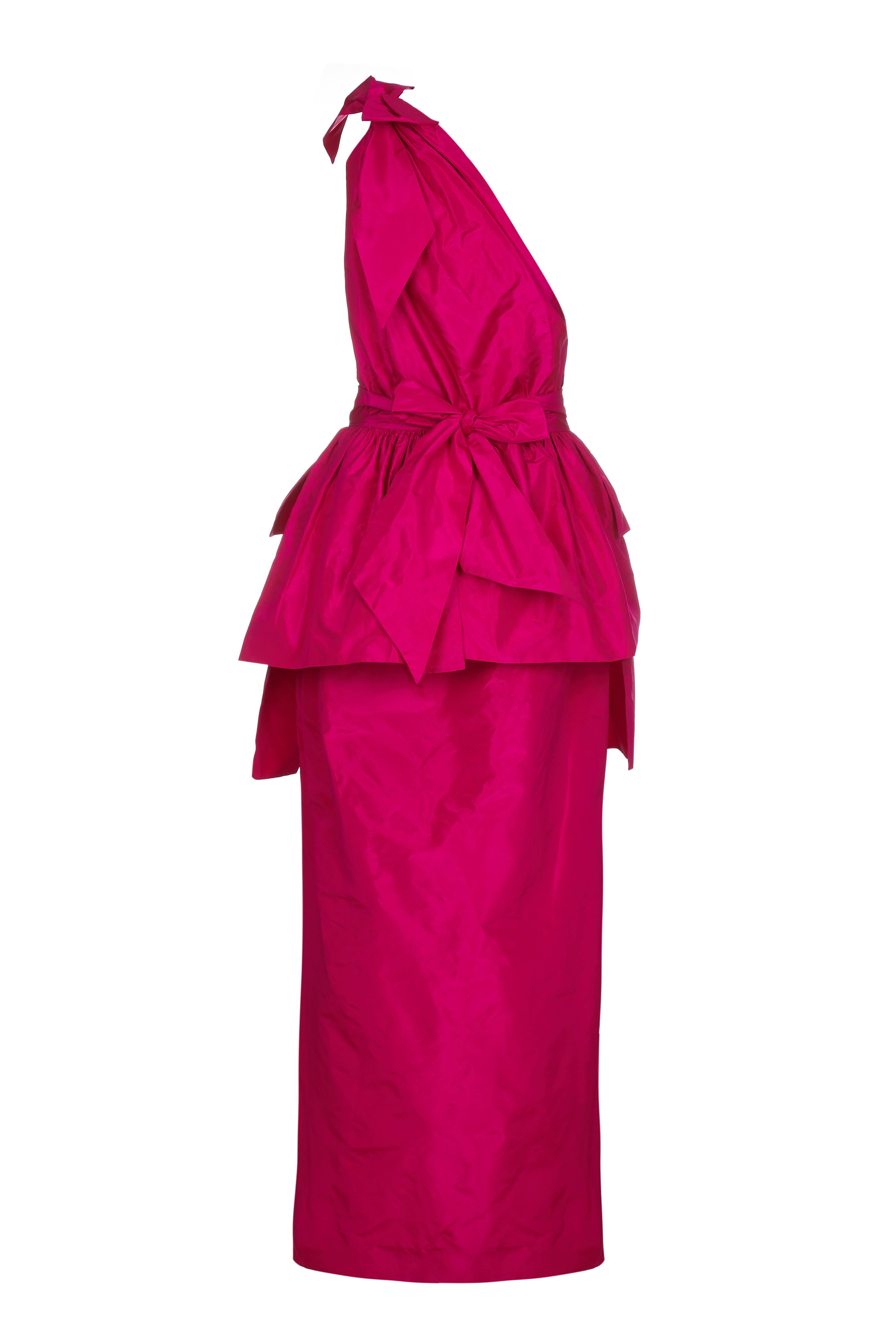 Amazing vintage Lanvin late 1970s early 1980s asymmetrical hot pink silk taffeta dress with separate peplum piece that ties around the waist.  We have styled the peplum with the tie at the back but it can be worn in any way, with the tie at the