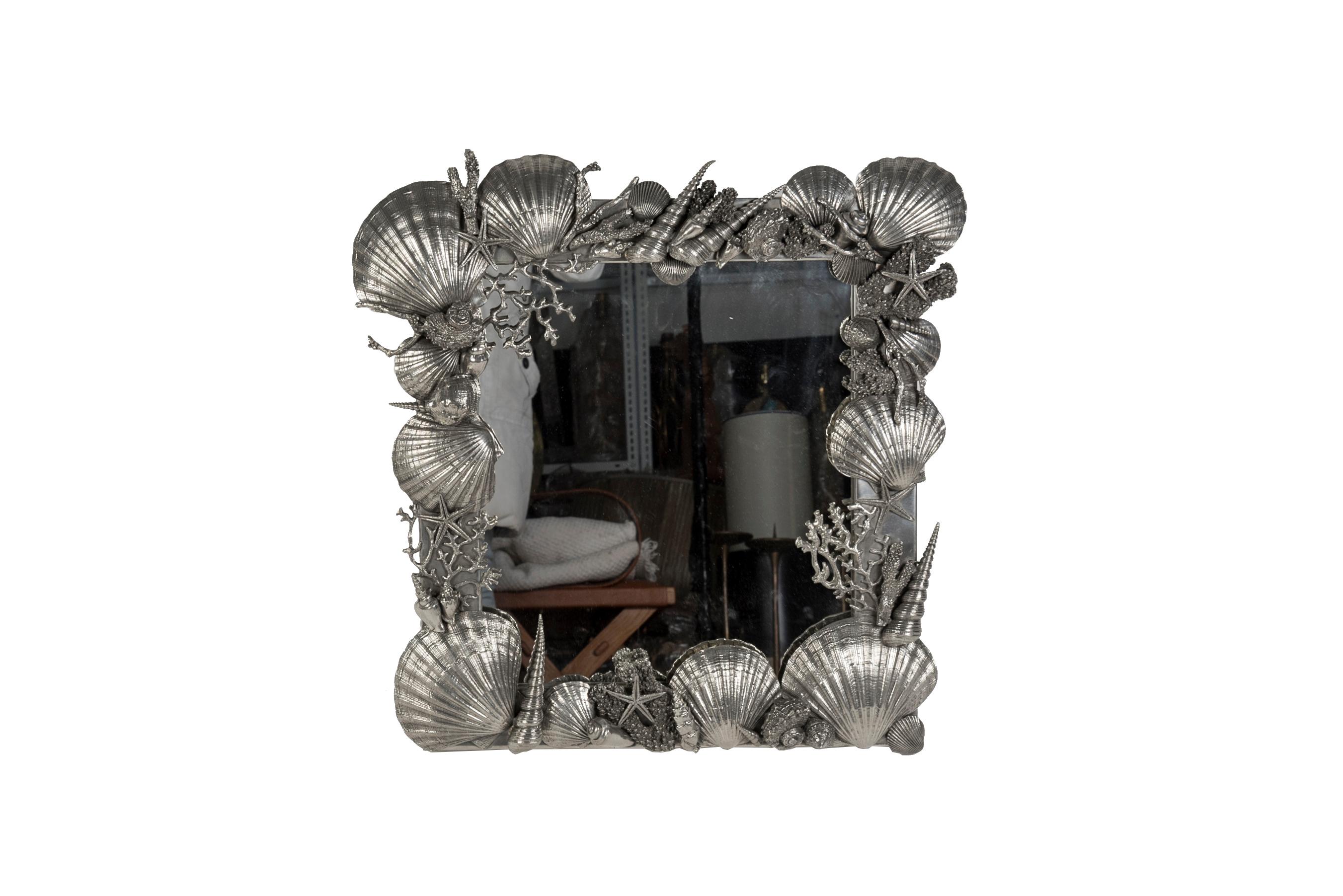 Rare polished pewter mirror in the style of the XVIII th century
Signed Figura Piero