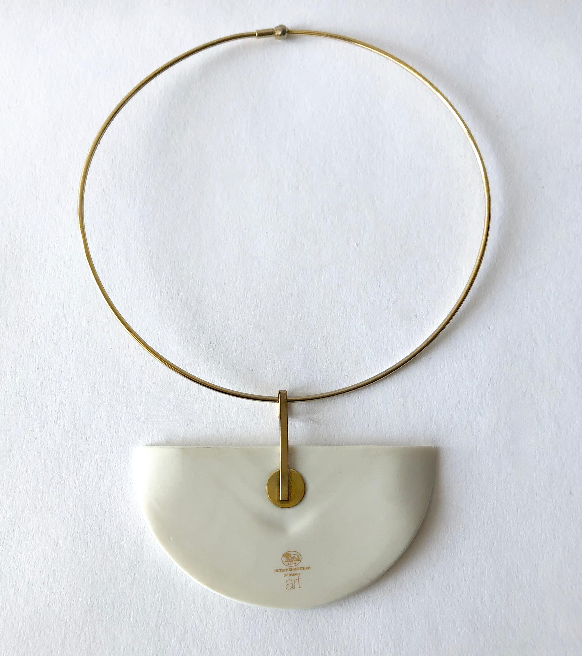 1980s porcelain half moon on gold tone metal necklace created by Hutschenreuther of Germany.  Pendant measures 2