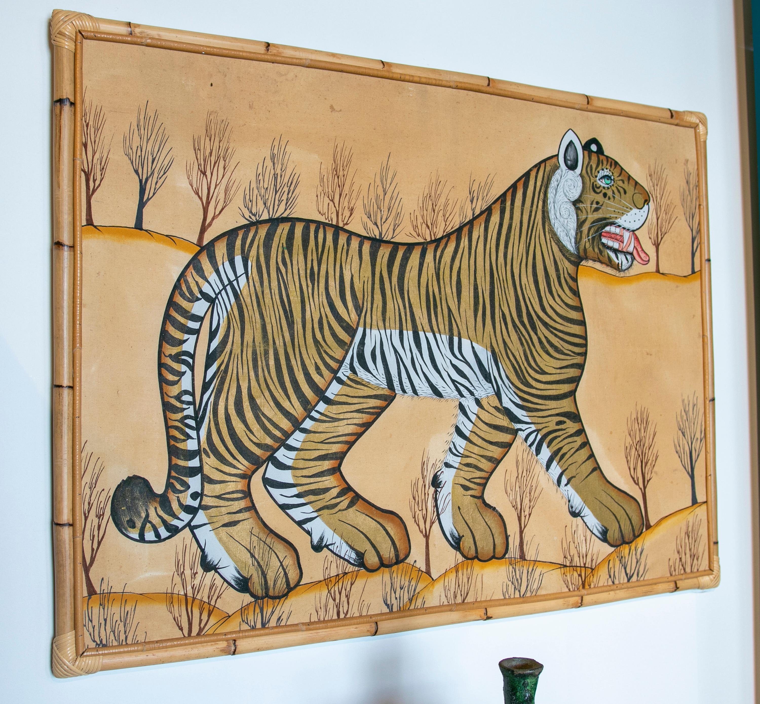 1980s Indian hand painted tiger painting with bamboo frame.