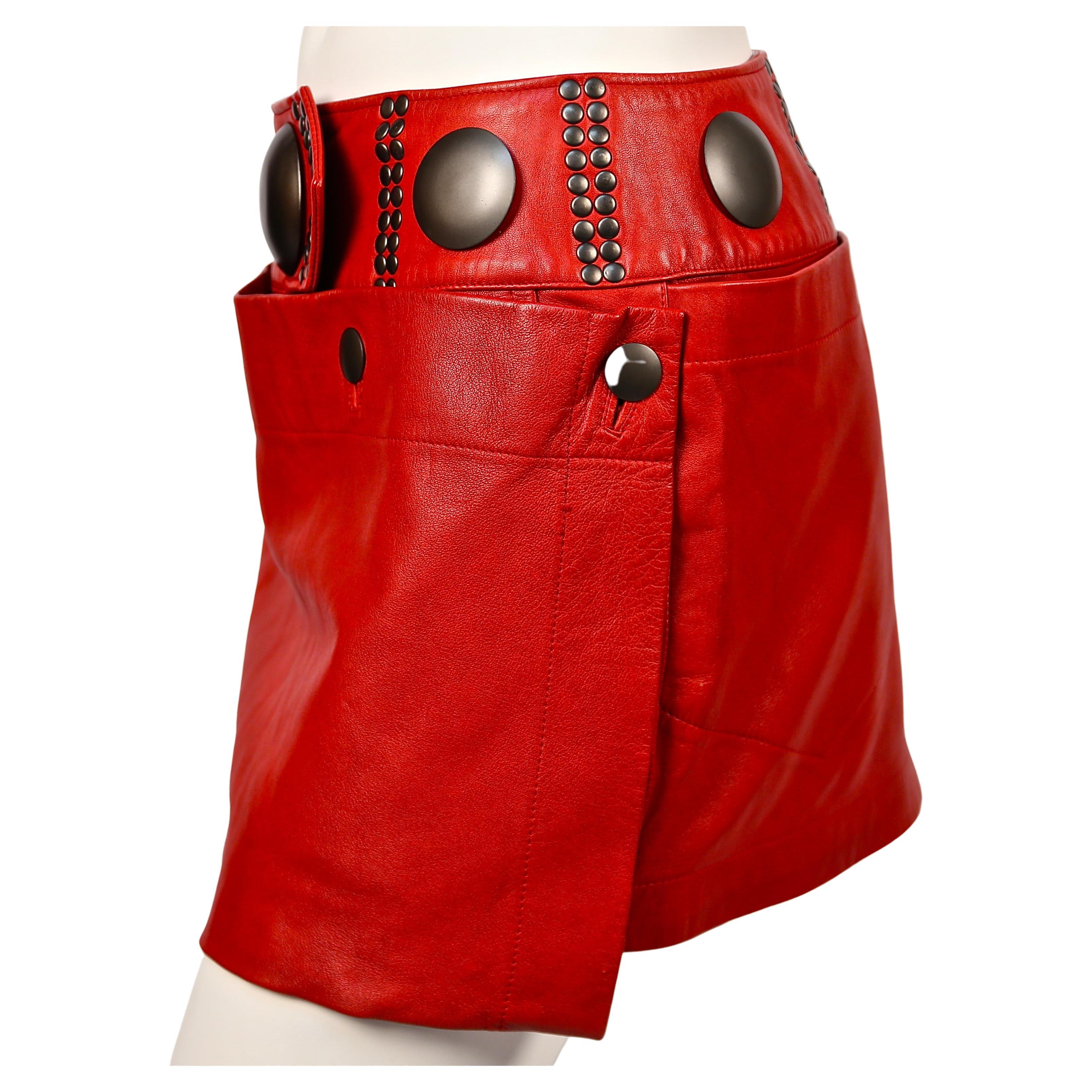1980's ISSEY MIYAKE unworn red leather mini skirt with oversized studs In New Condition For Sale In San Fransisco, CA