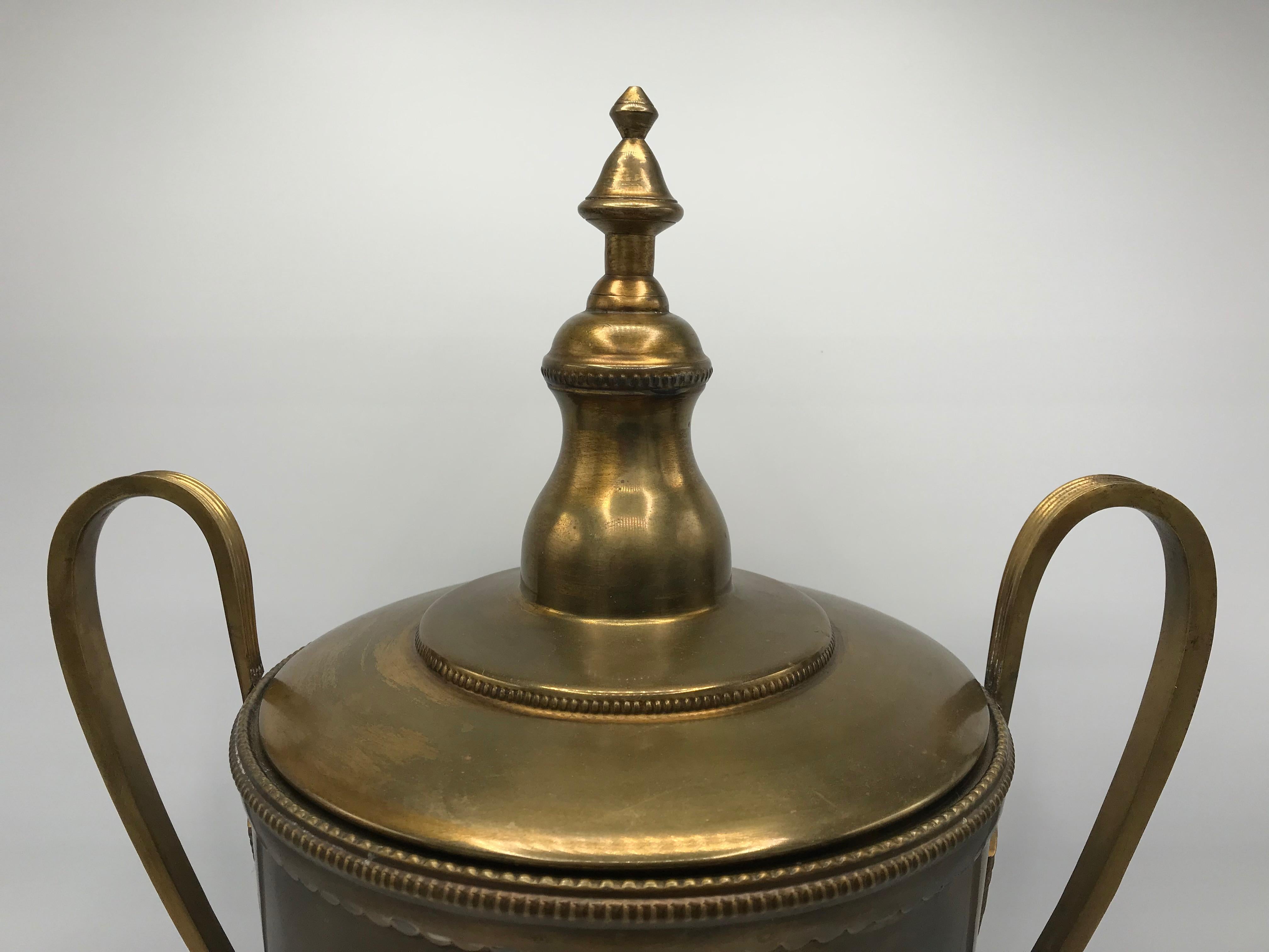 Offered is a gorgeous, 1980s Italian brushed-brass lidded urn. The piece has amazing craftsmanship and attention to detail, with its allover grape motif, scalloped edgings, finials, and fine lines. Heavy, weighs 7.5lbs.