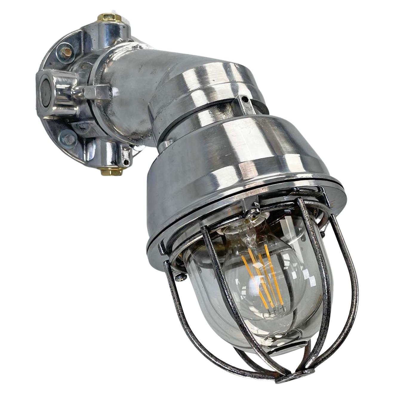 1980's Italian Cast Aluminum Flameproof Cantilever Wall Sconce with Cage & Glass For Sale