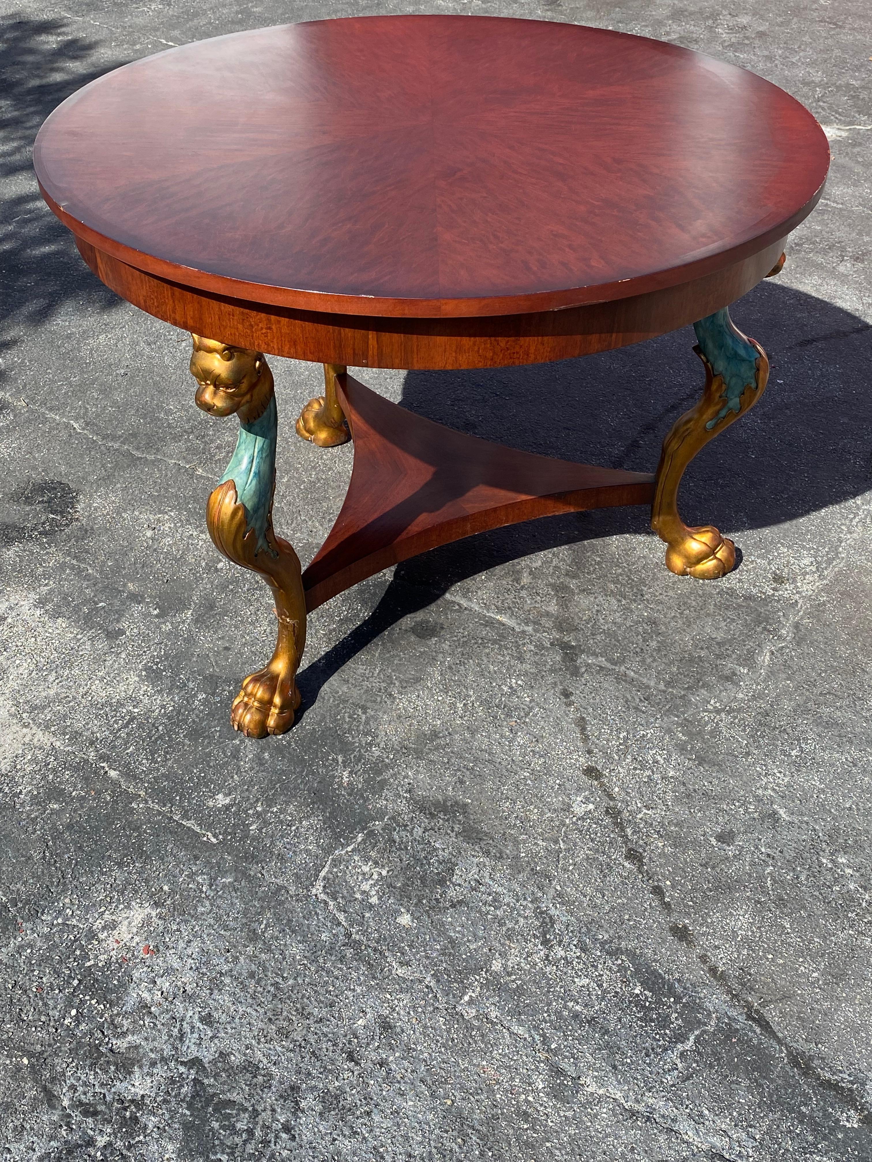 italien 1980 Italian Round Tripod Empire Style Lion Carved Wood Center Dining Table en vente